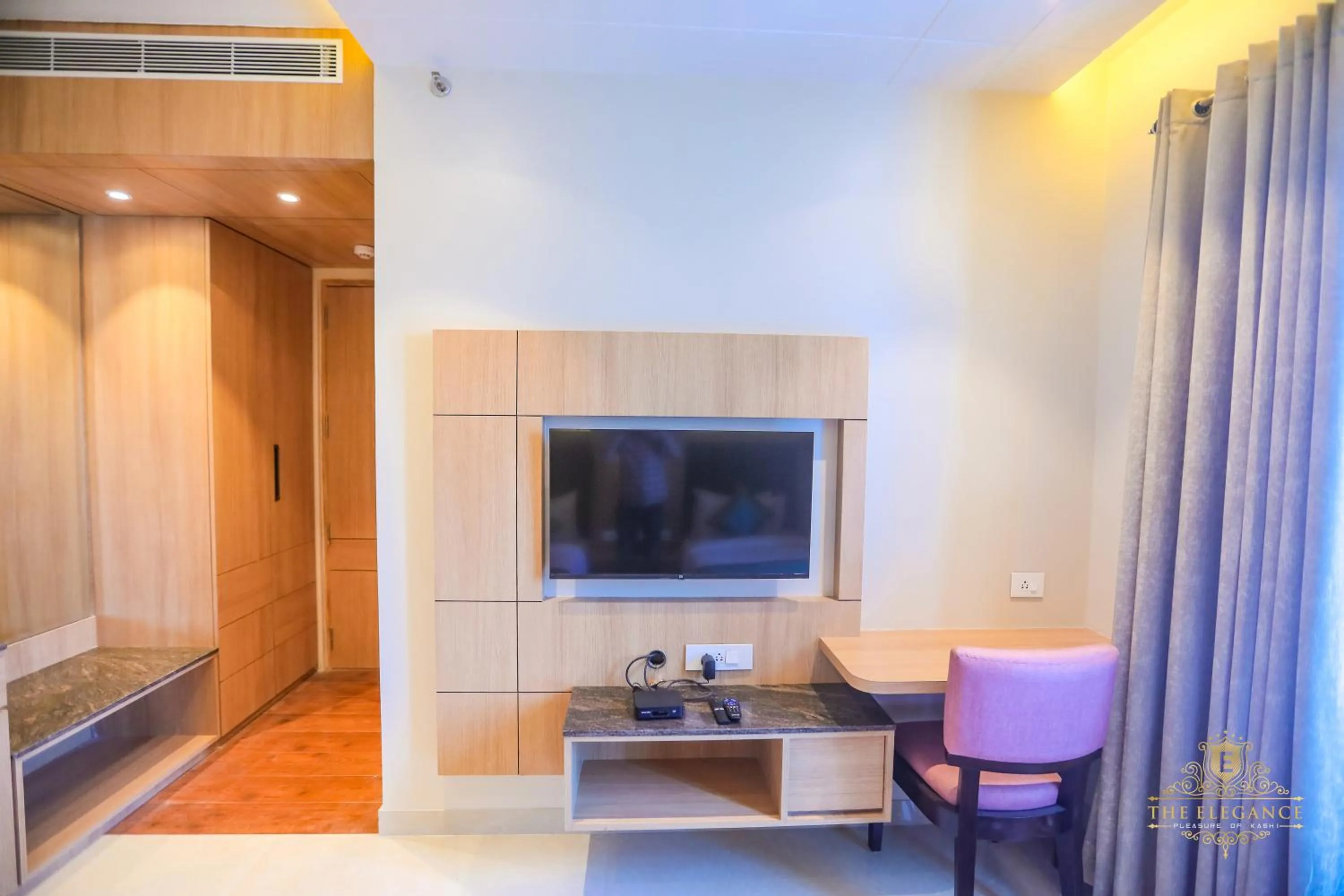 Bed in The Elegance Hotel