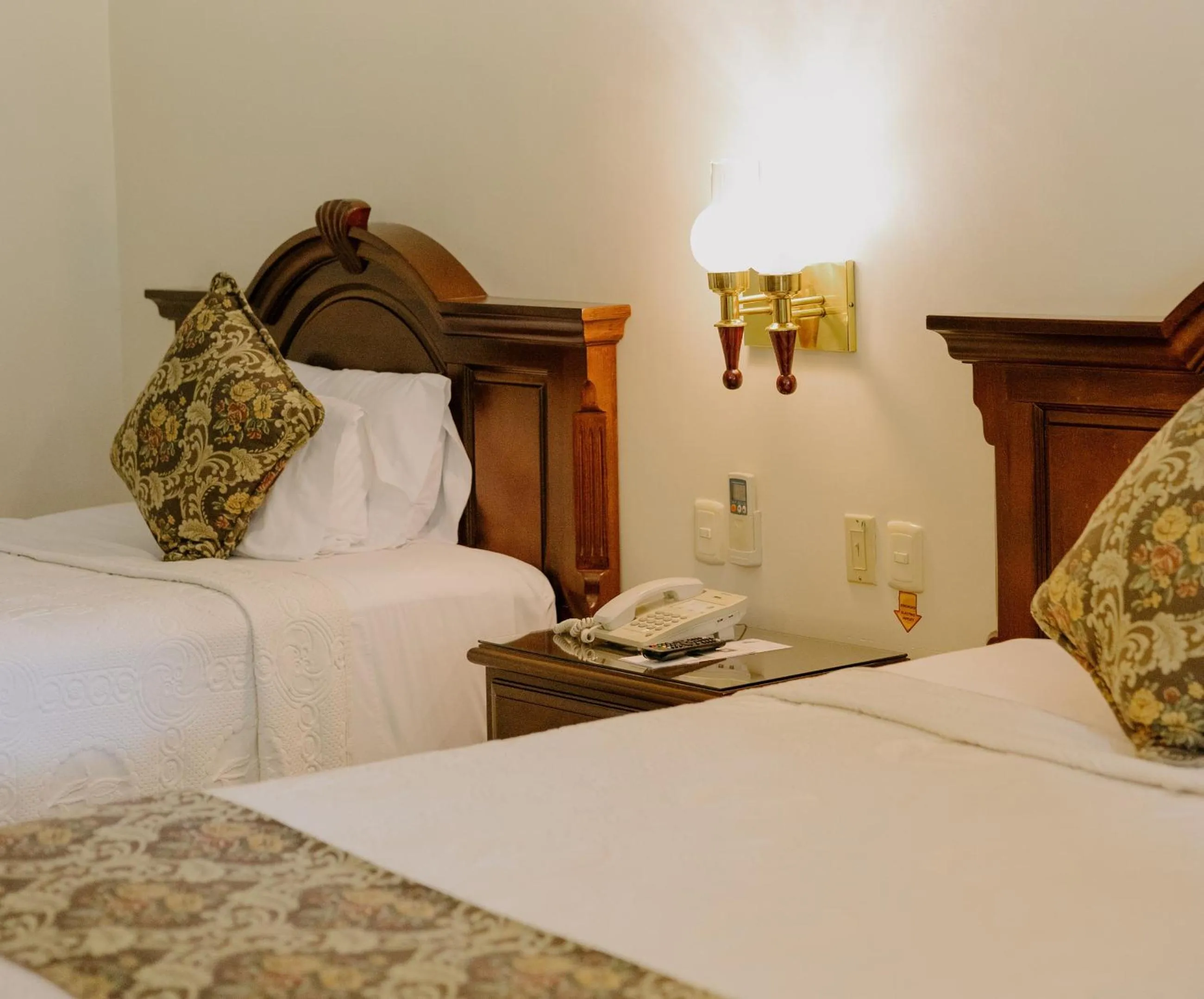 Bed in Hotel Hacienda Los Laureles