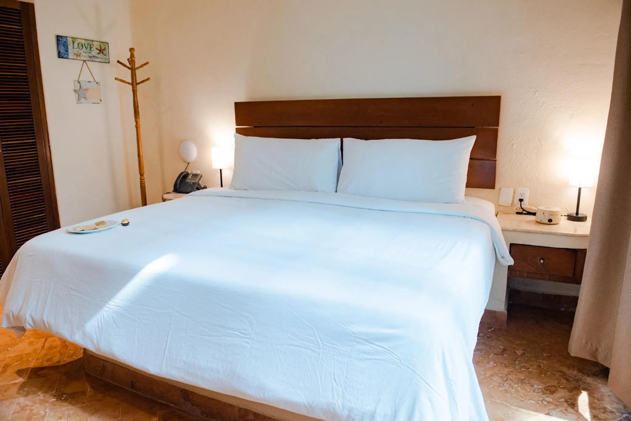 Bed in Porto Playa Condo Hotel and Beach Club