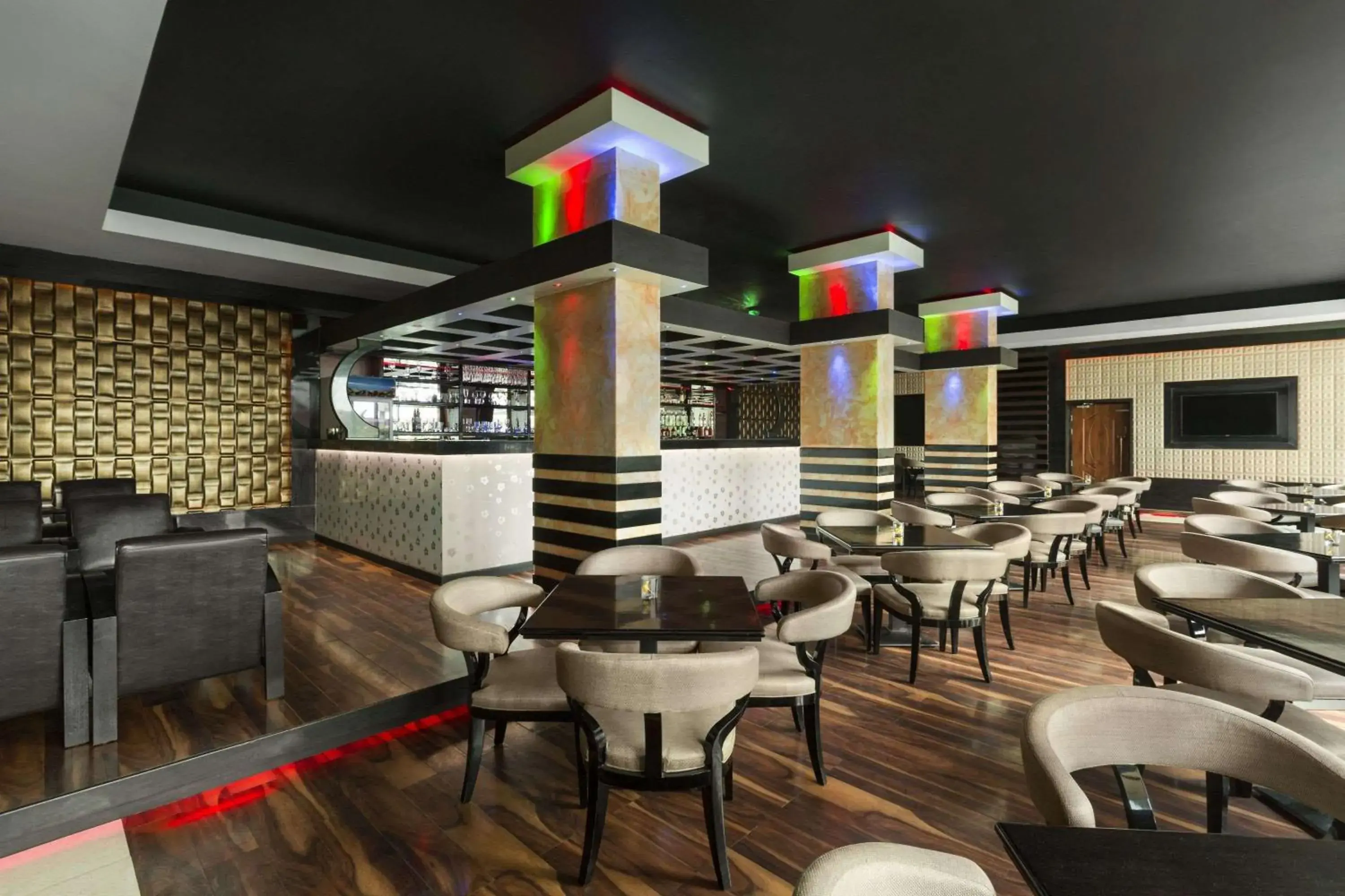Lounge or bar in Ramada by Wyndham Alleppey Lounge or bar in Ramada by Wyndham Alleppey