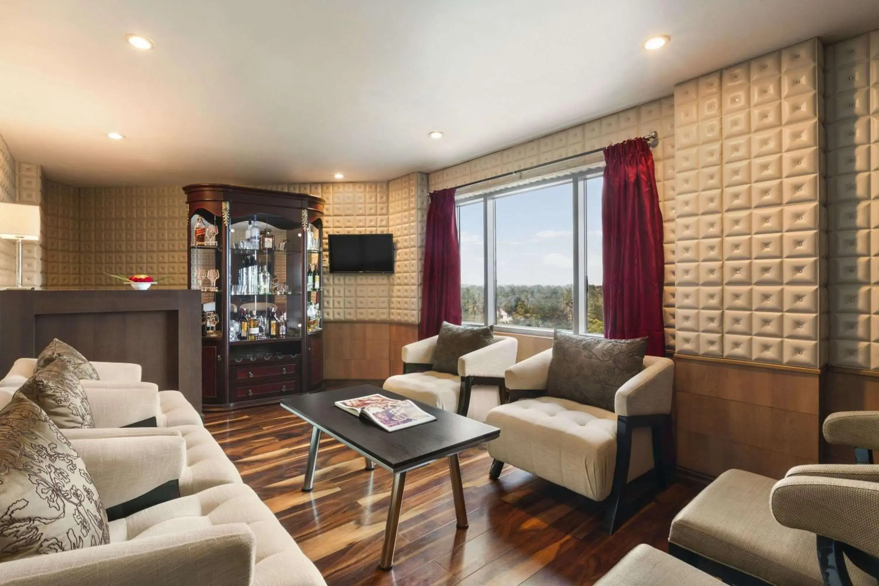 Lounge or bar in Ramada by Wyndham Alleppey Lounge or bar in Ramada by Wyndham Alleppey