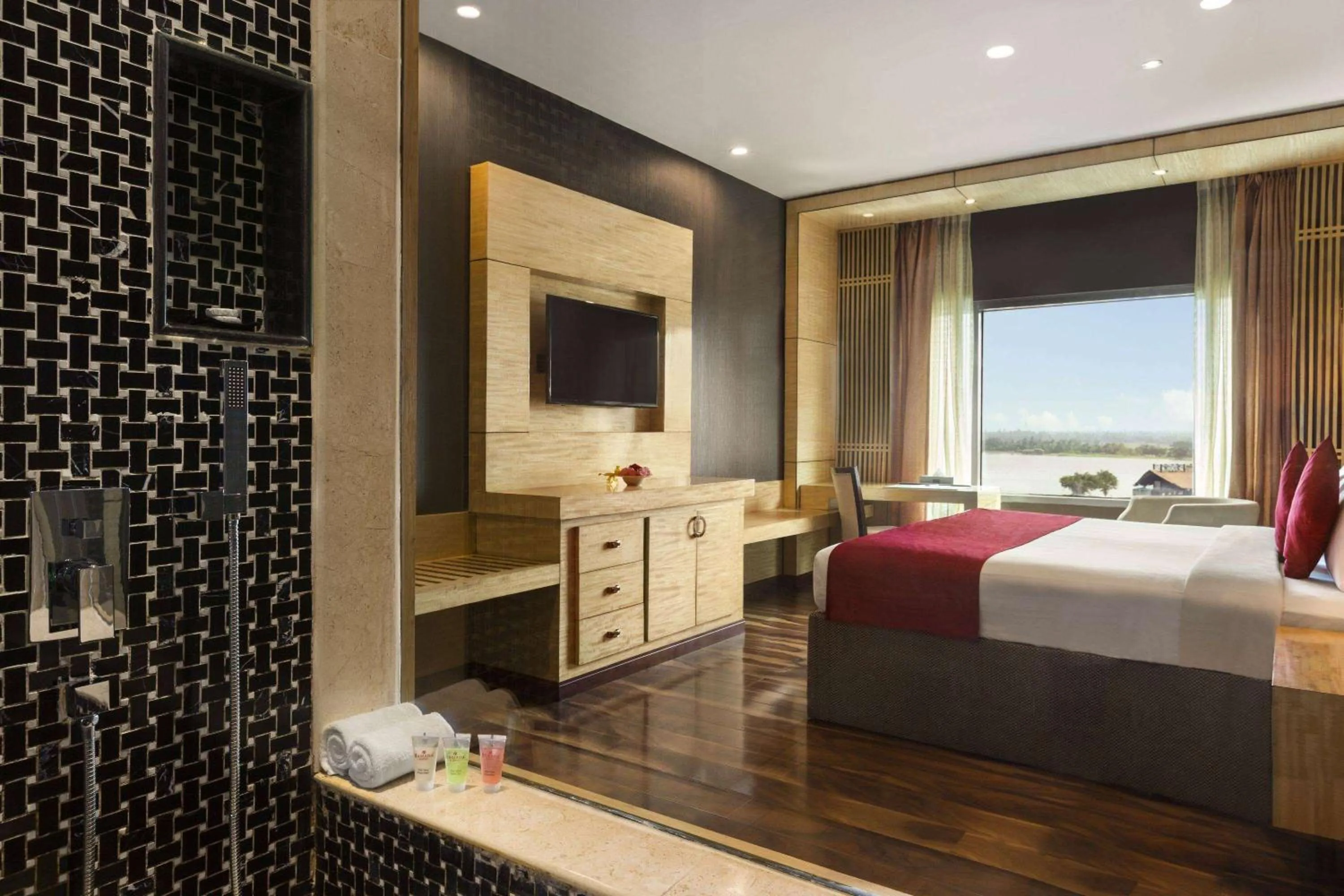 Photo of the whole room, Bed in Ramada by Wyndham Alleppey