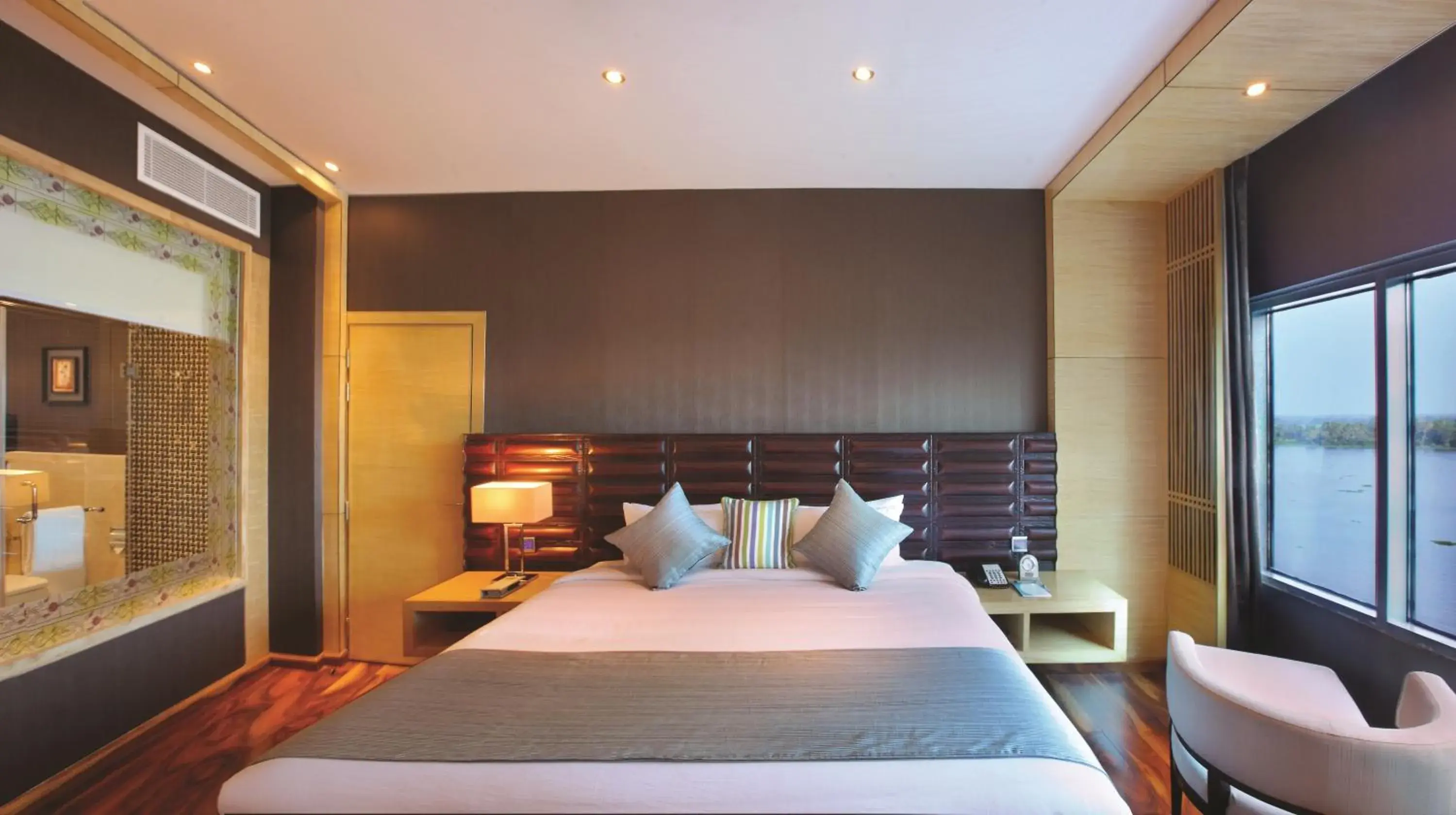 Bed in Ramada by Wyndham Alleppey Bed in Ramada by Wyndham Alleppey