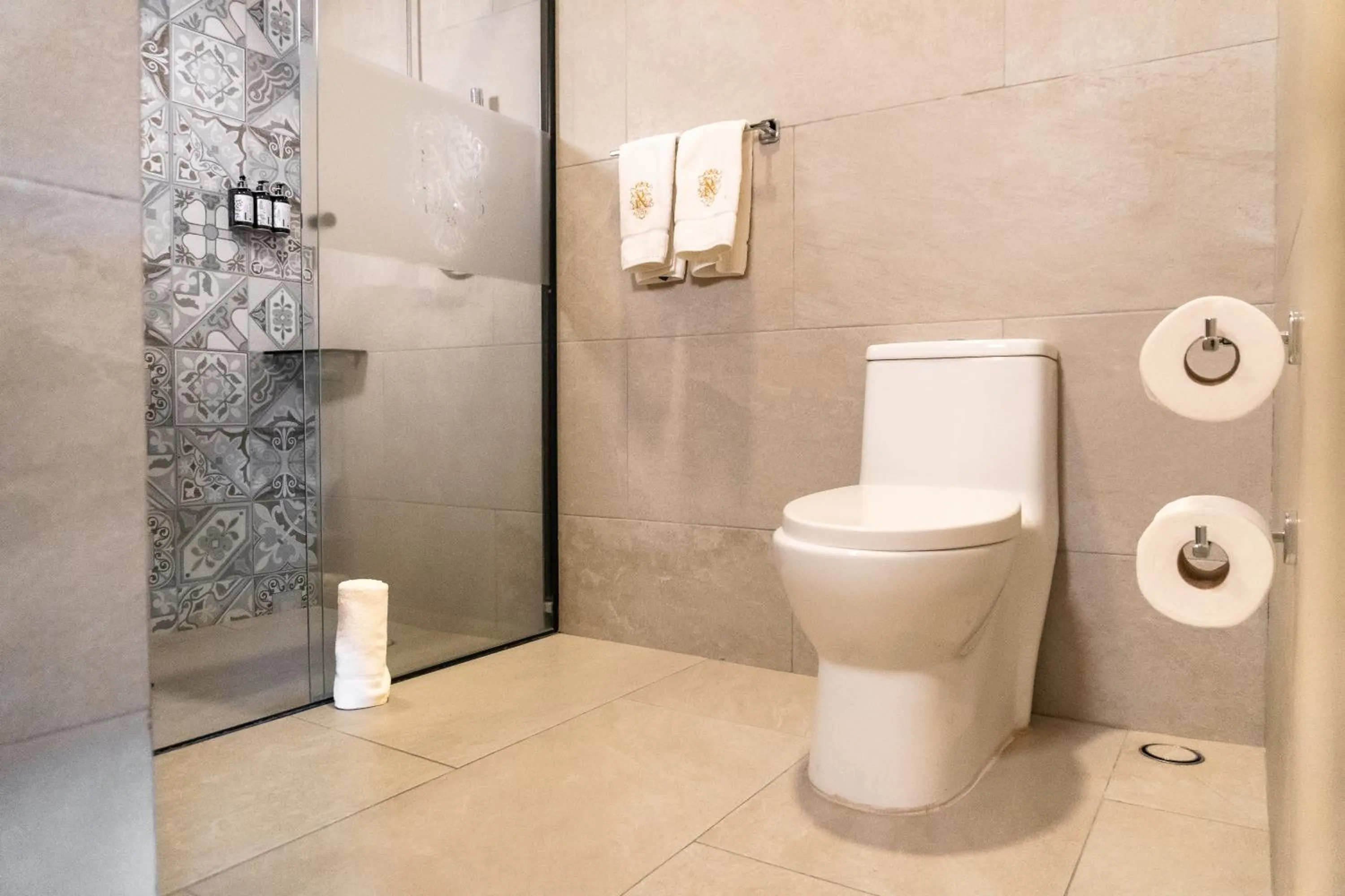 Bathroom in voco Royalty Puebla Downtown by IHG