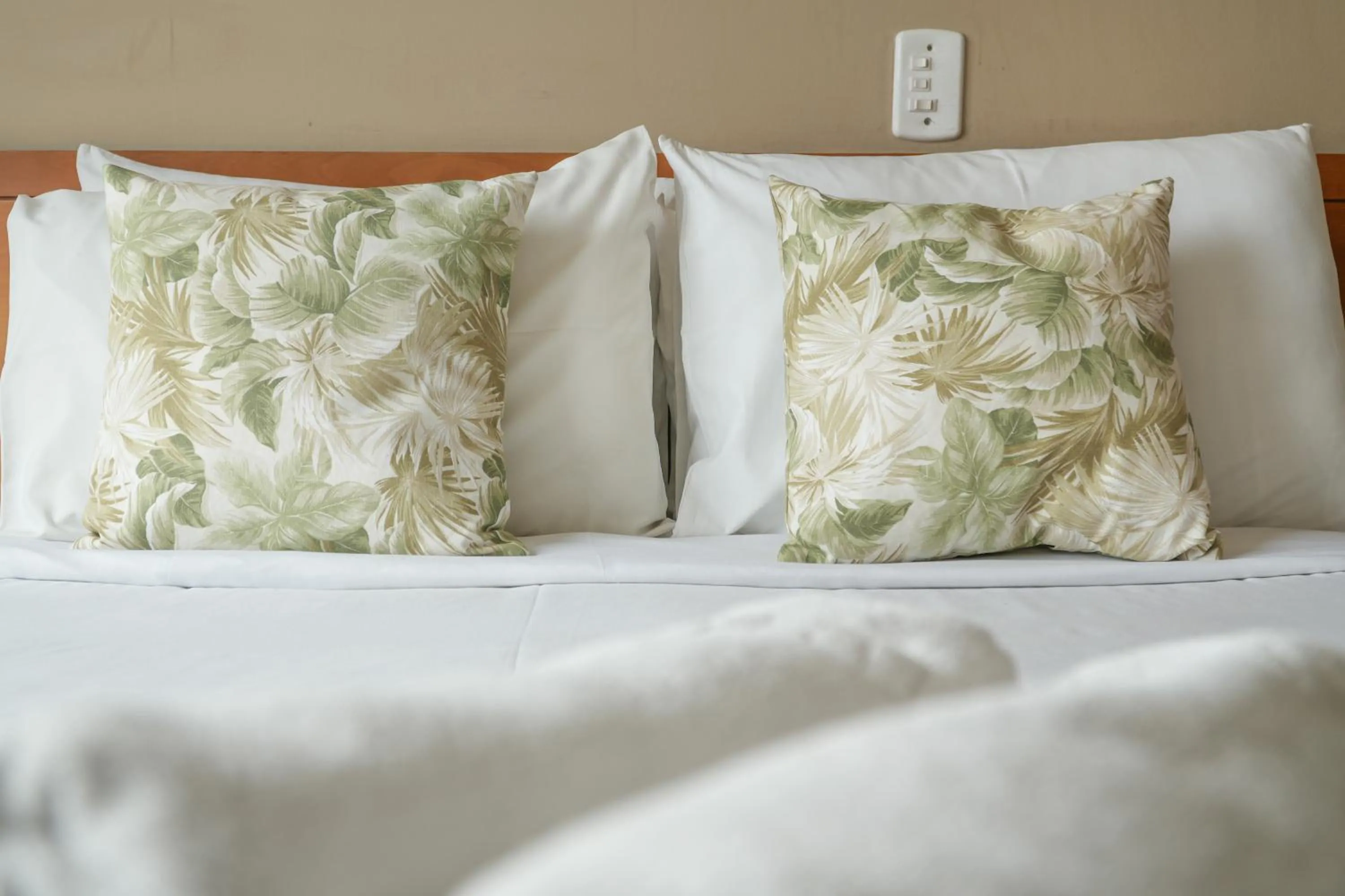 Bed in Pousada Parque das Flores