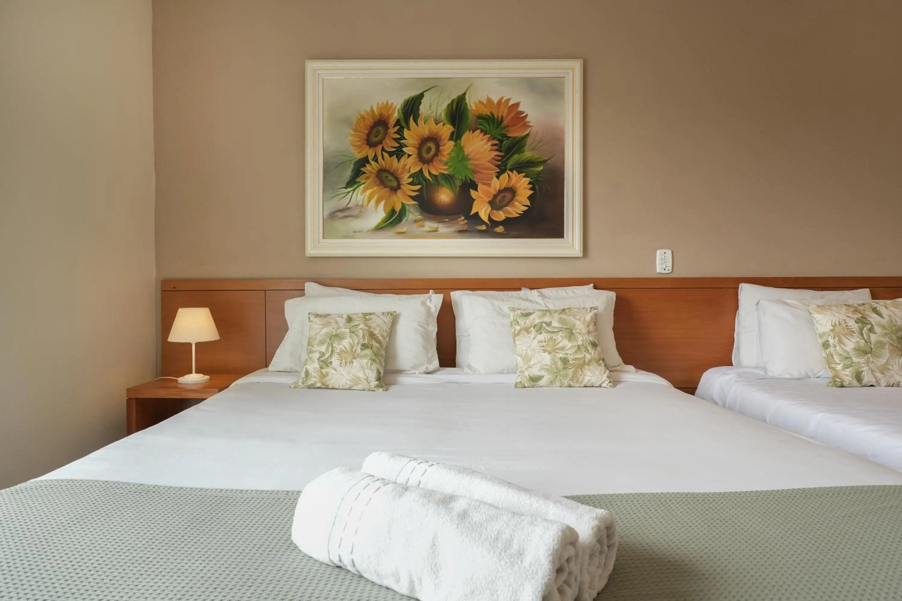 Bed in Pousada Parque das Flores