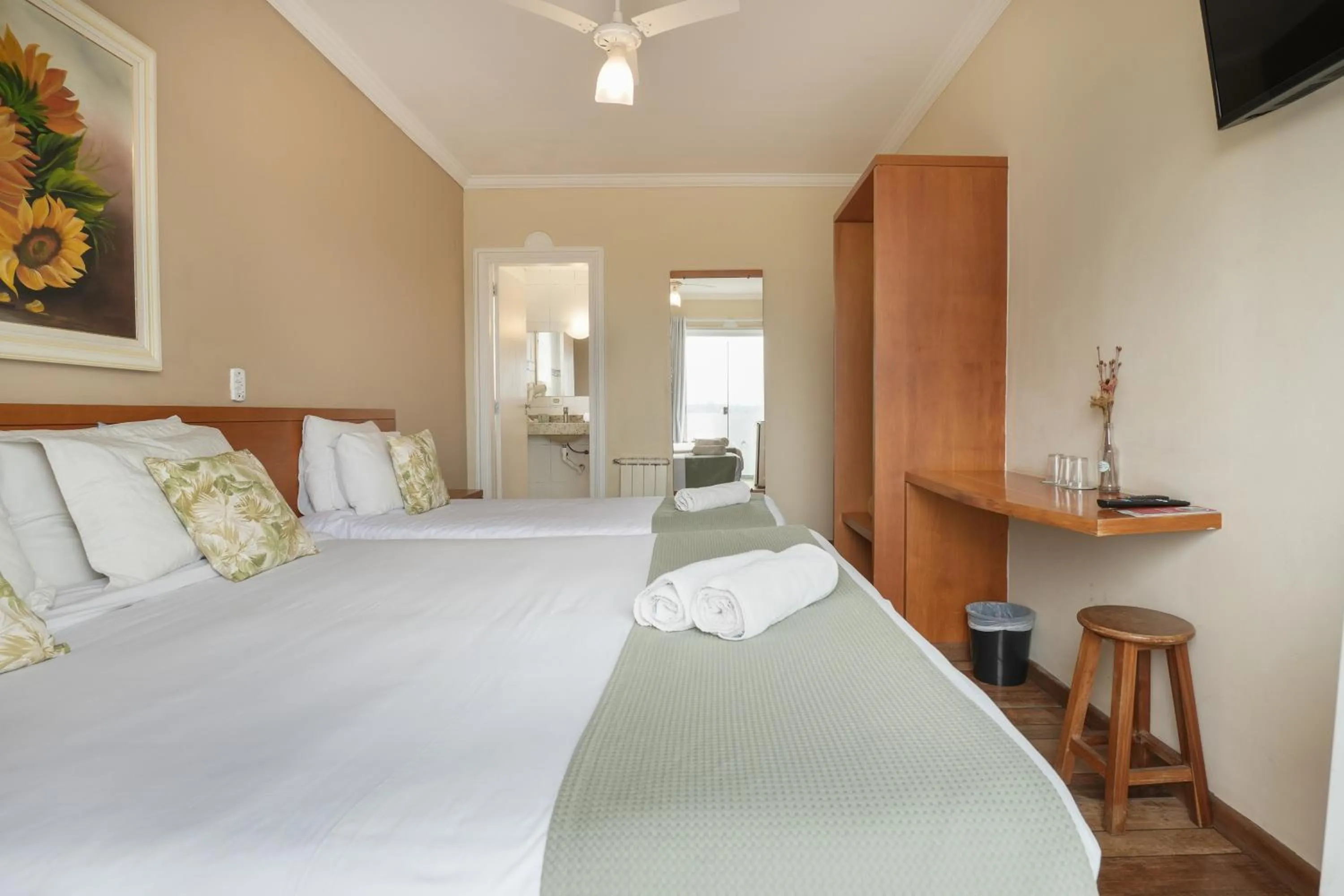 Bed in Pousada Parque das Flores