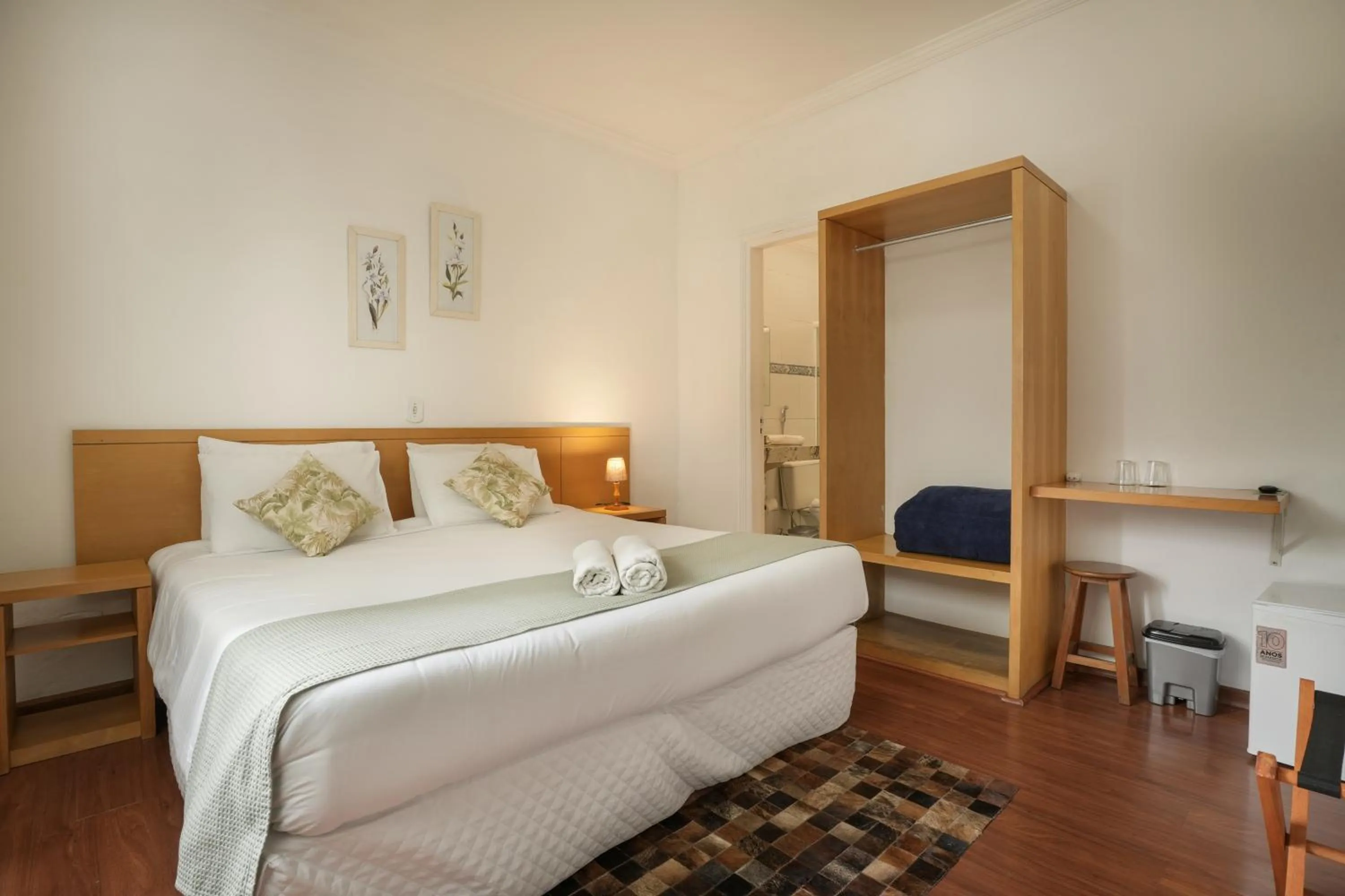 Bed in Pousada Parque das Flores