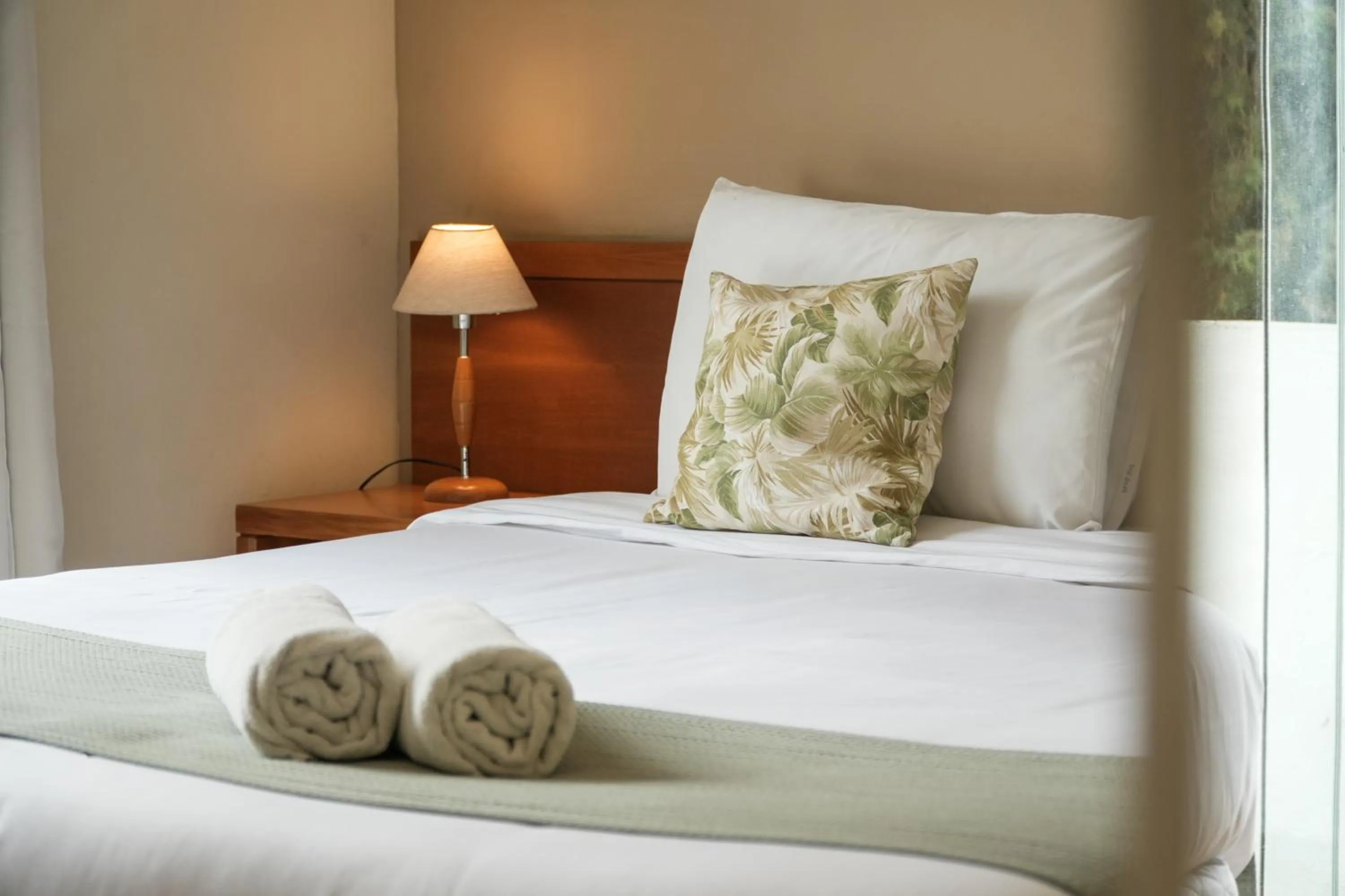 Bed in Pousada Parque das Flores