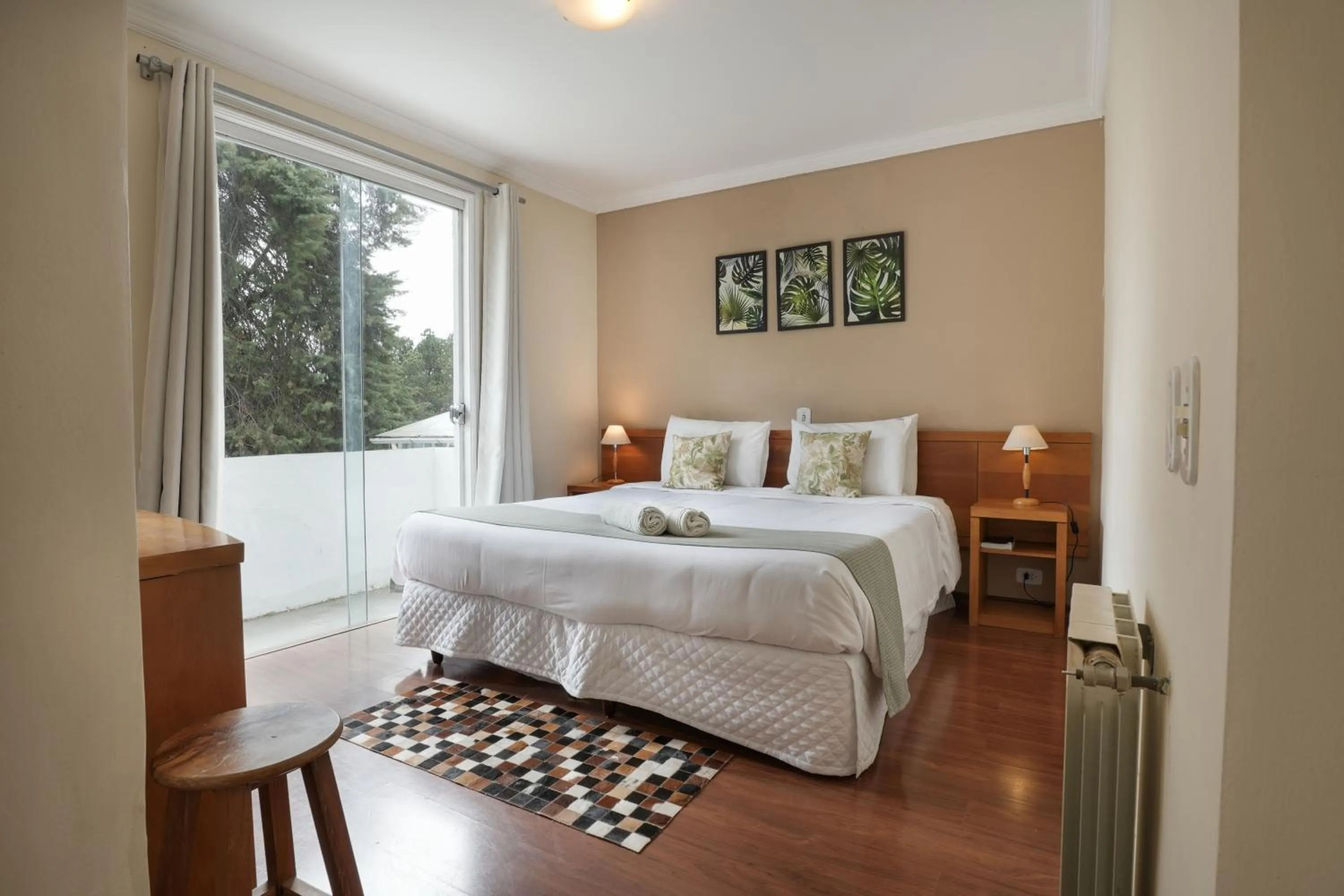 Bed in Pousada Parque das Flores