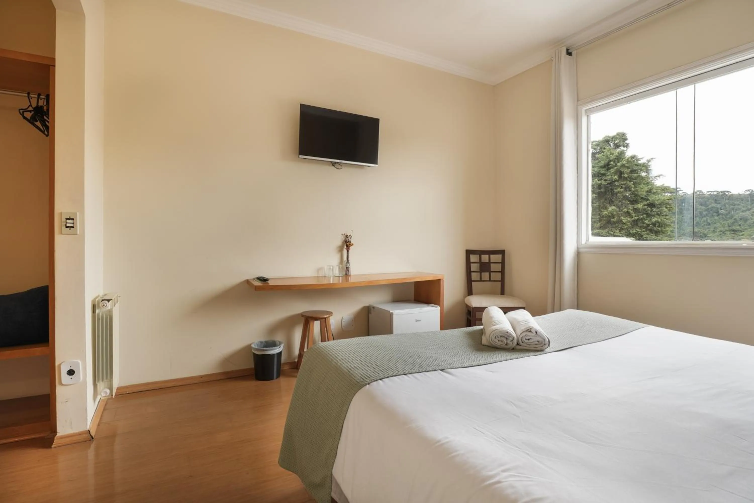 Bed in Pousada Parque das Flores