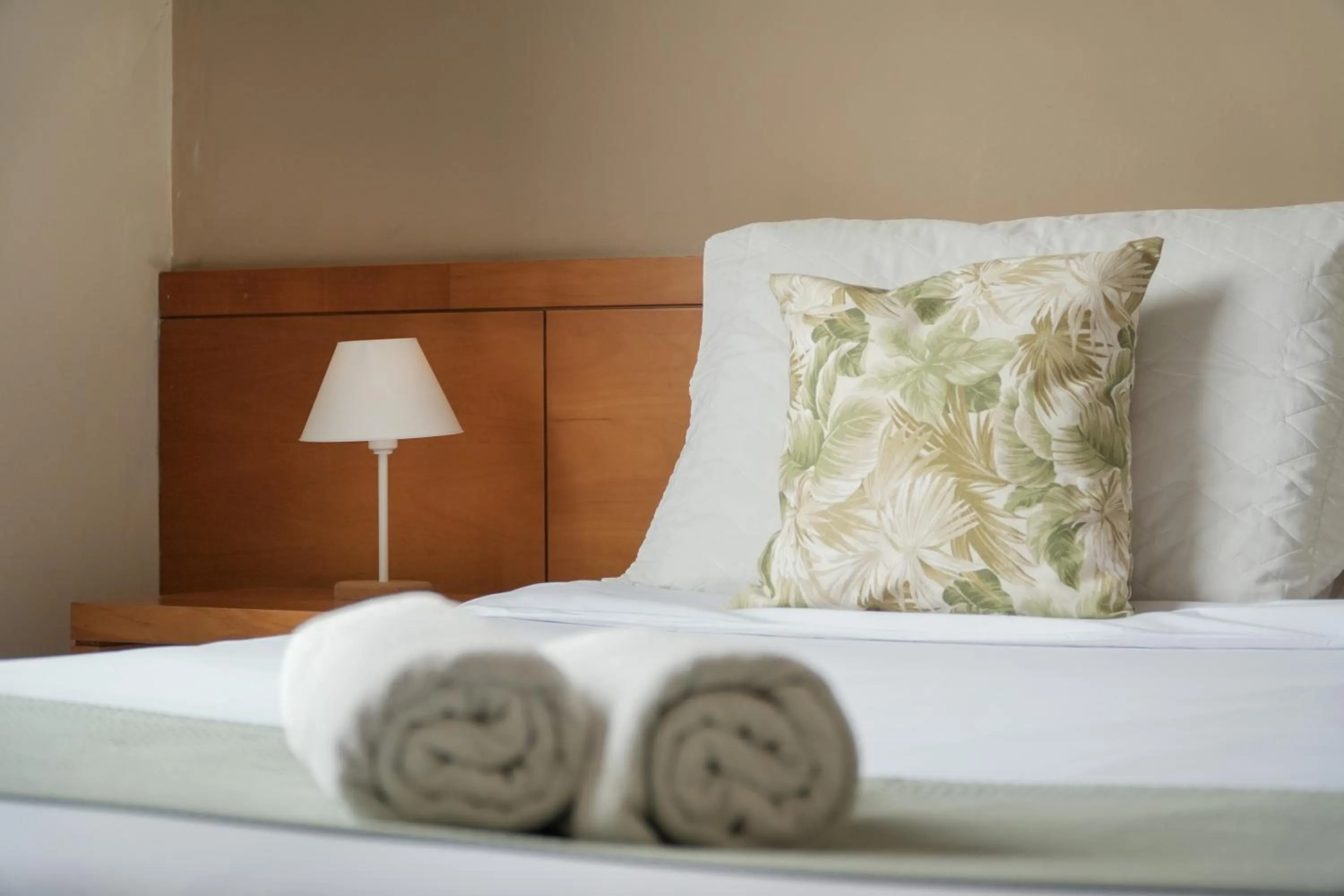 Bed in Pousada Parque das Flores