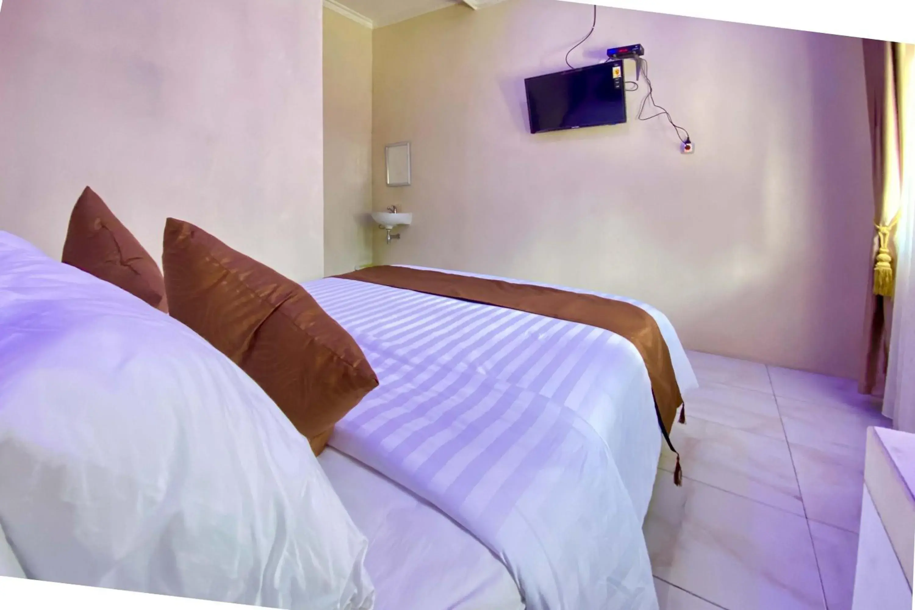 Bed in Homestay Banteng Adventure Dieng Mitra RedDoorz Bed in Homestay Banteng Adventure Dieng Mitra RedDoorz
