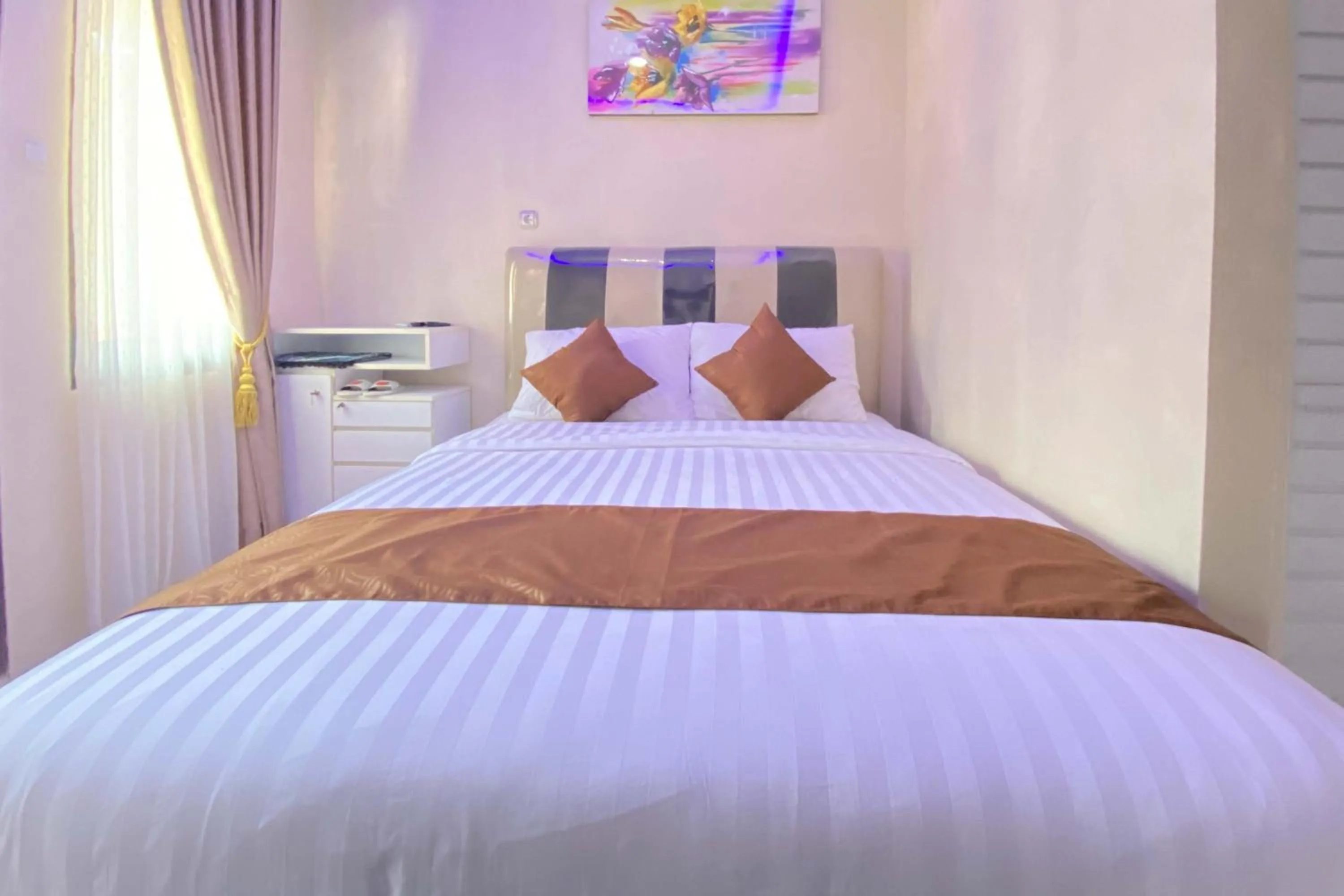 Bed in Homestay Banteng Adventure Dieng Mitra RedDoorz