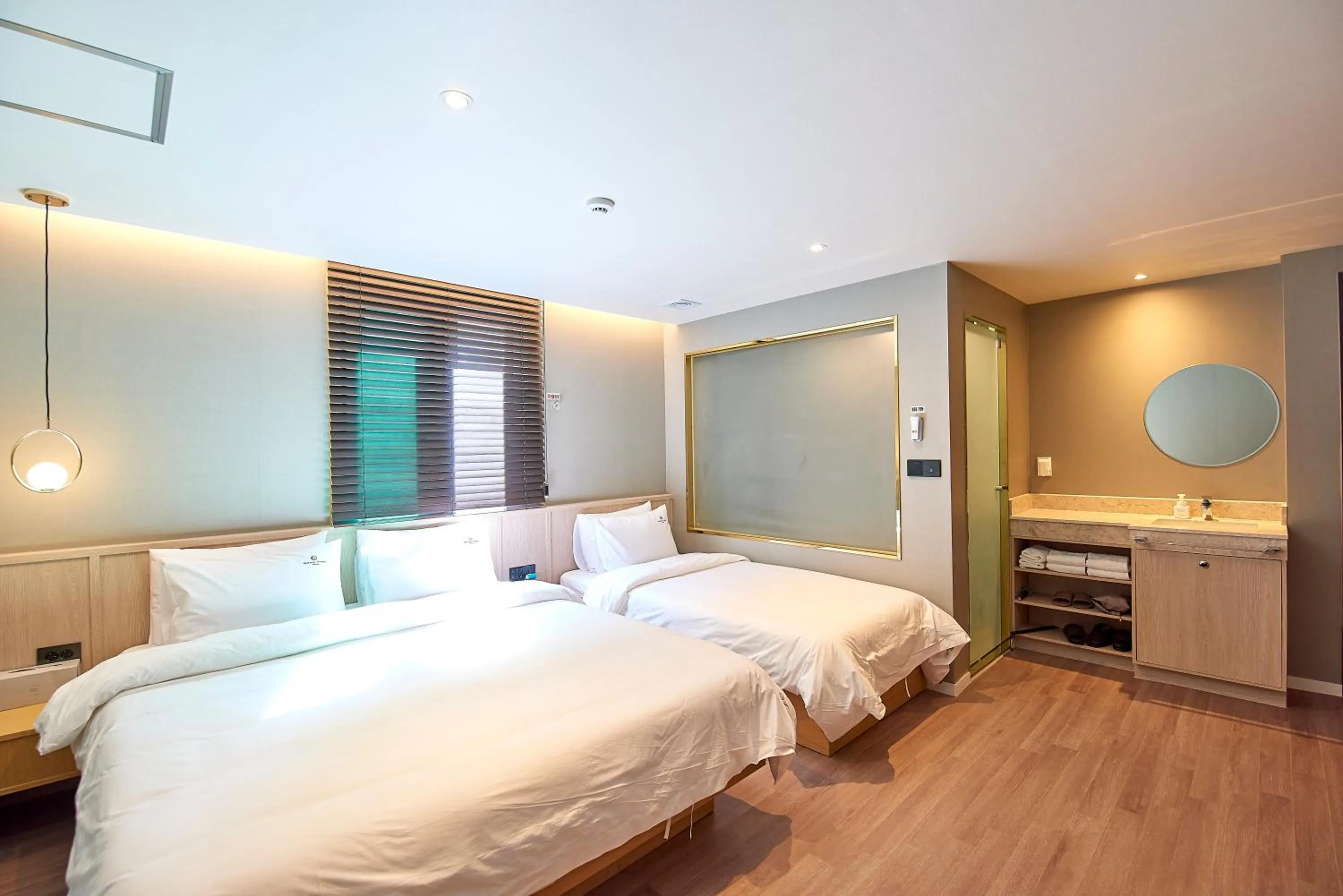 Bed in BONATHREE HOTEL