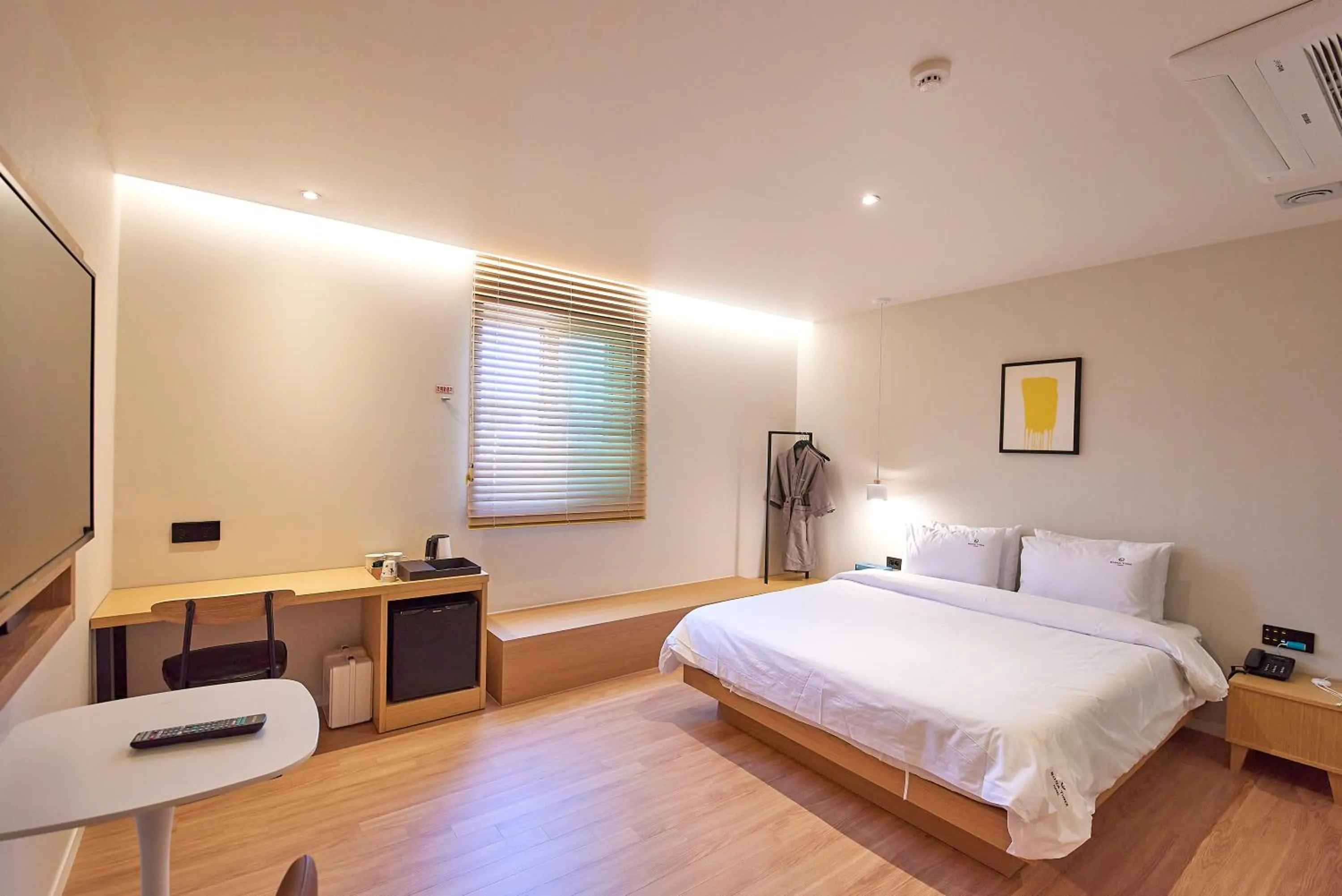 Bed in BONATHREE HOTEL