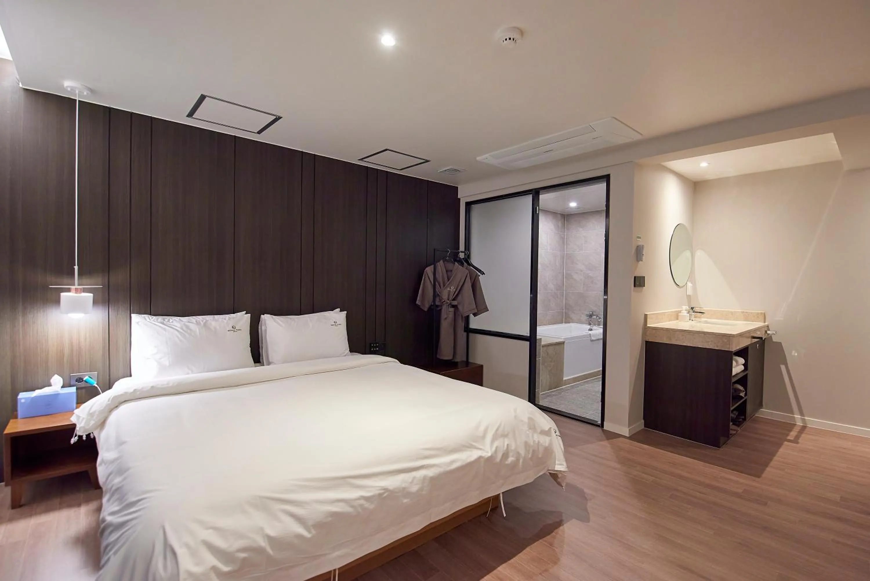 Bed in BONATHREE HOTEL