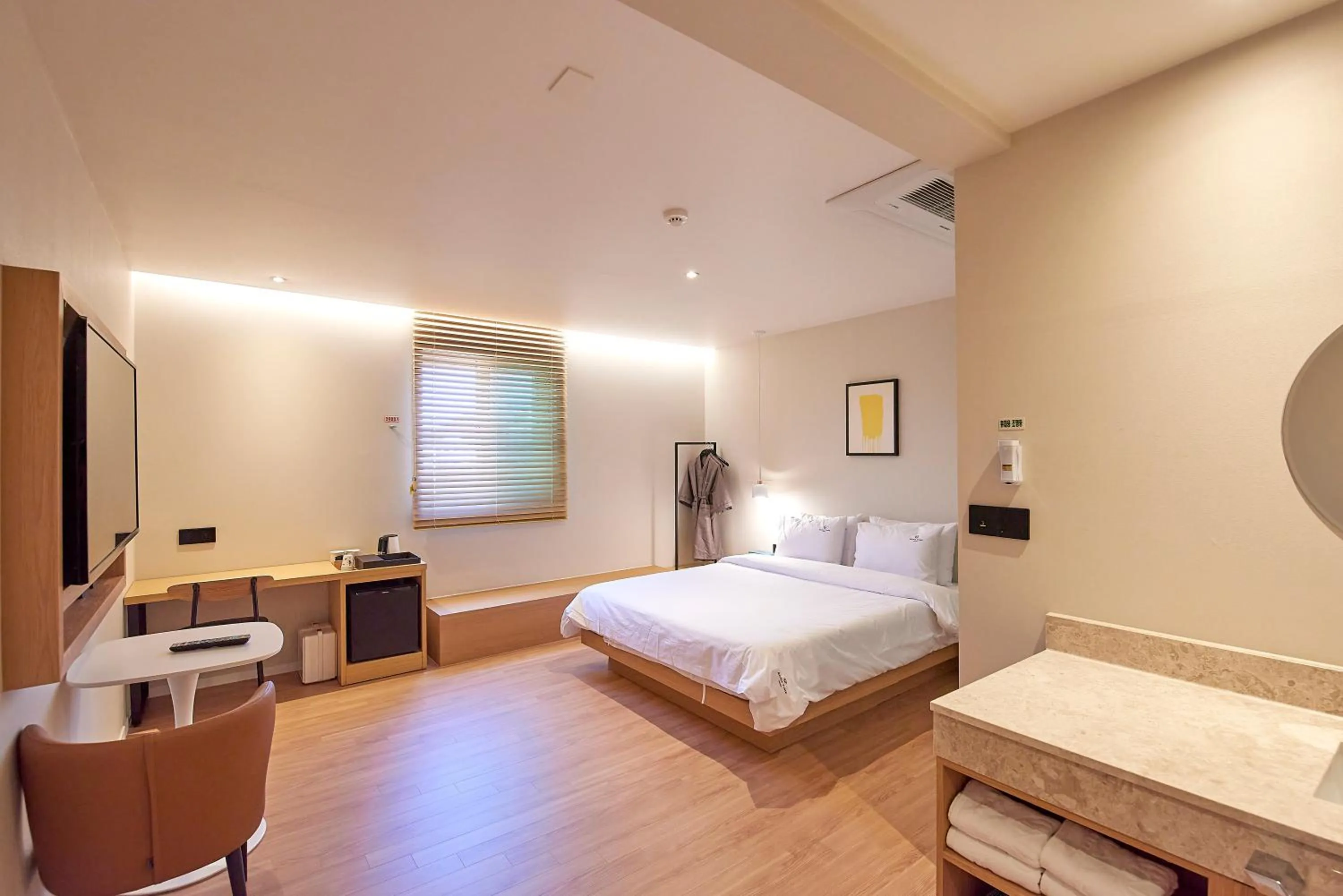 Bed in BONATHREE HOTEL