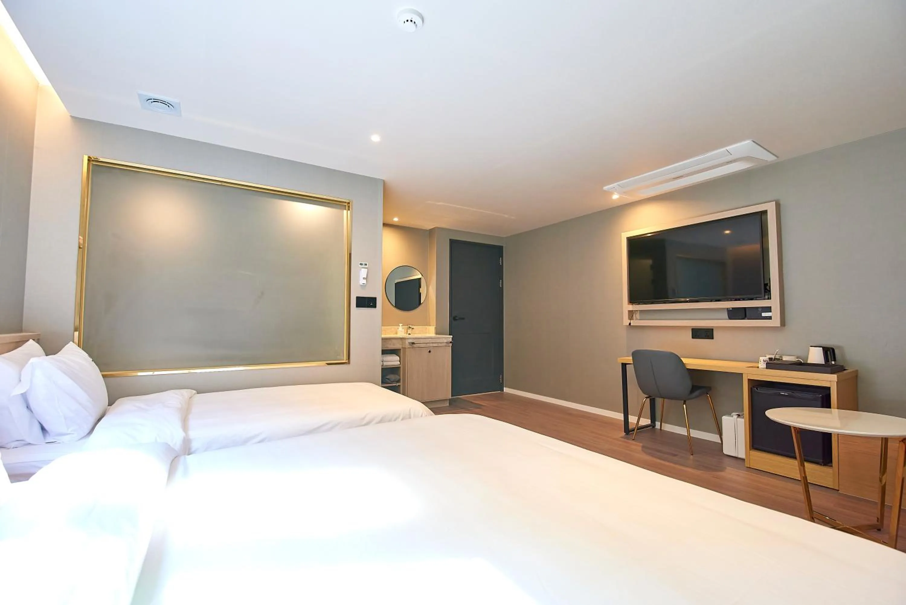 Bed in BONATHREE HOTEL