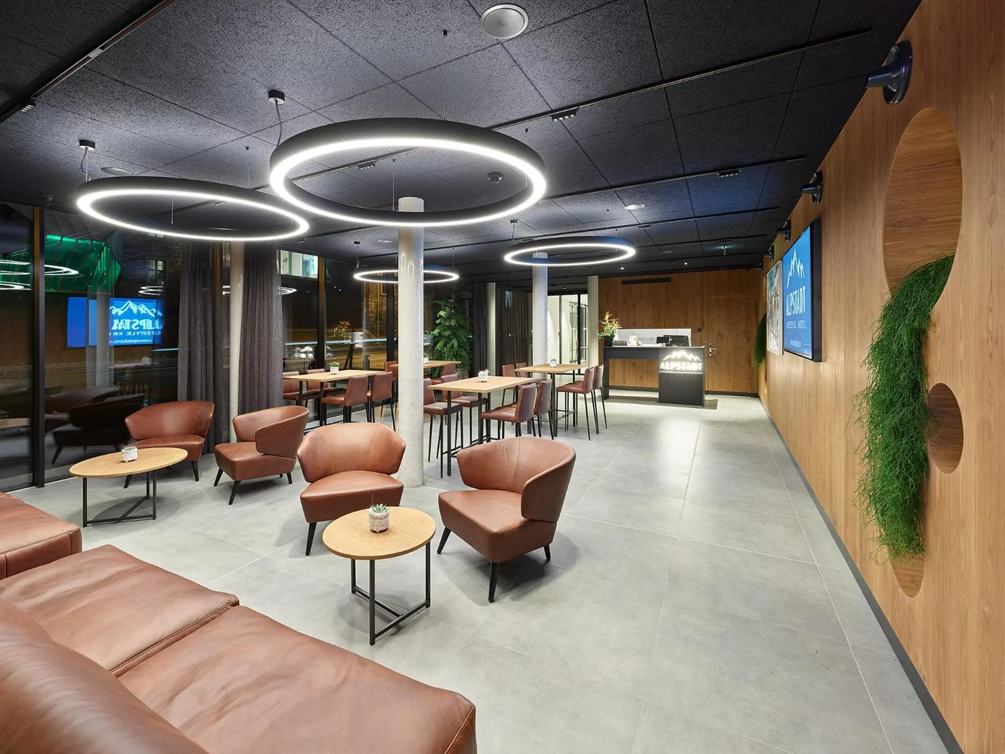 Lobby or reception in ALPSTADT LIFESTYLE Hotel