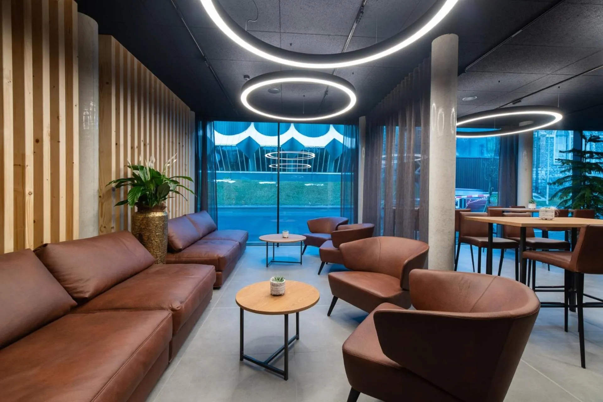 Lobby or reception in ALPSTADT LIFESTYLE Hotel