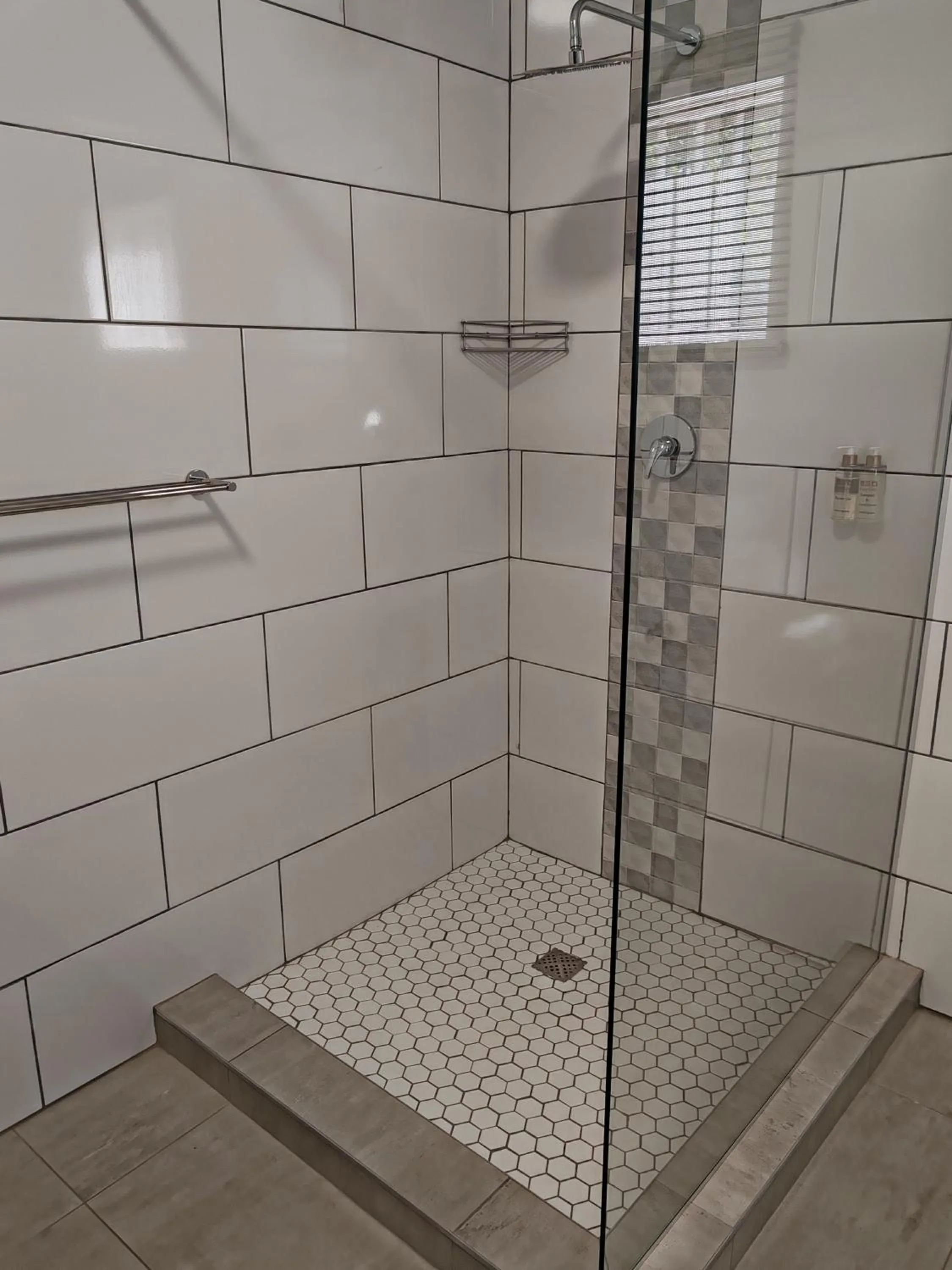 Shower in Stoep Cafe Guest House