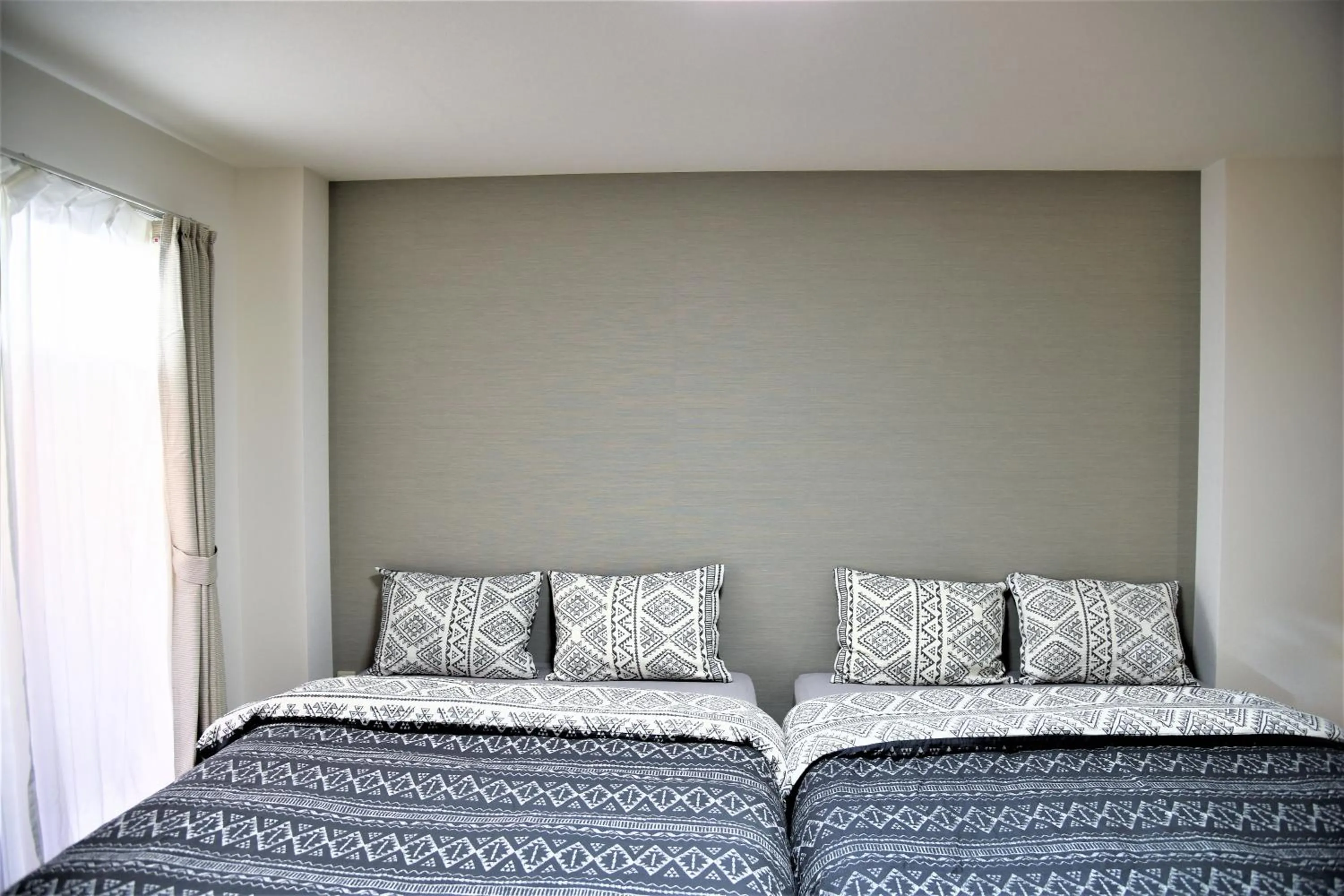 Bed in U-shuku Kyoto Fushimi