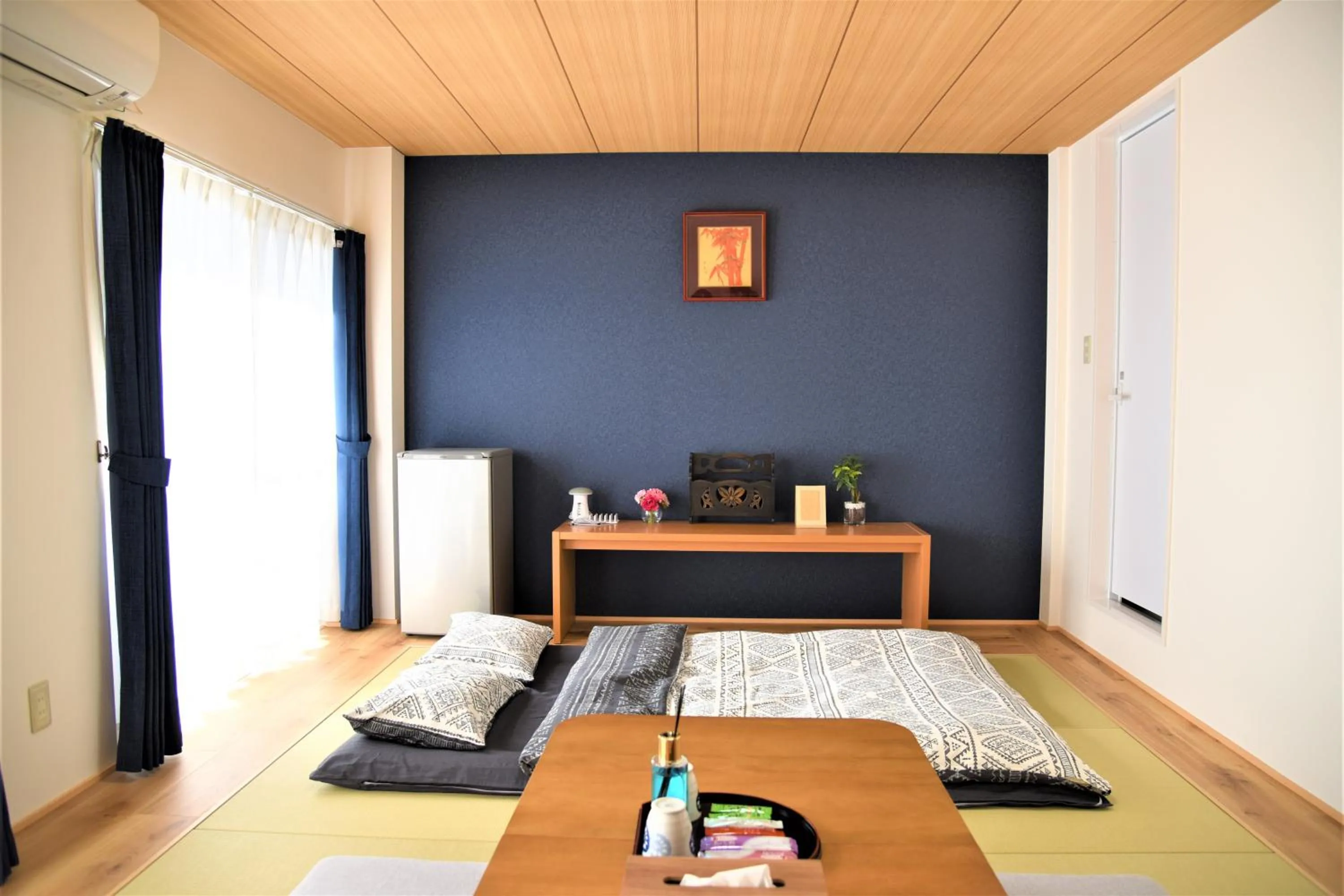 Bed in U-shuku Kyoto Fushimi