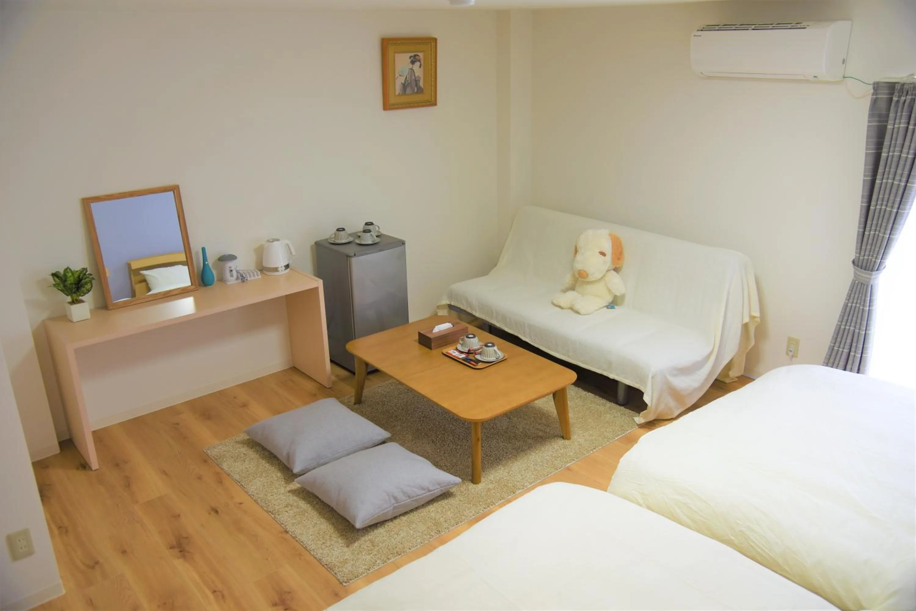 Bed in U-shuku Kyoto Fushimi