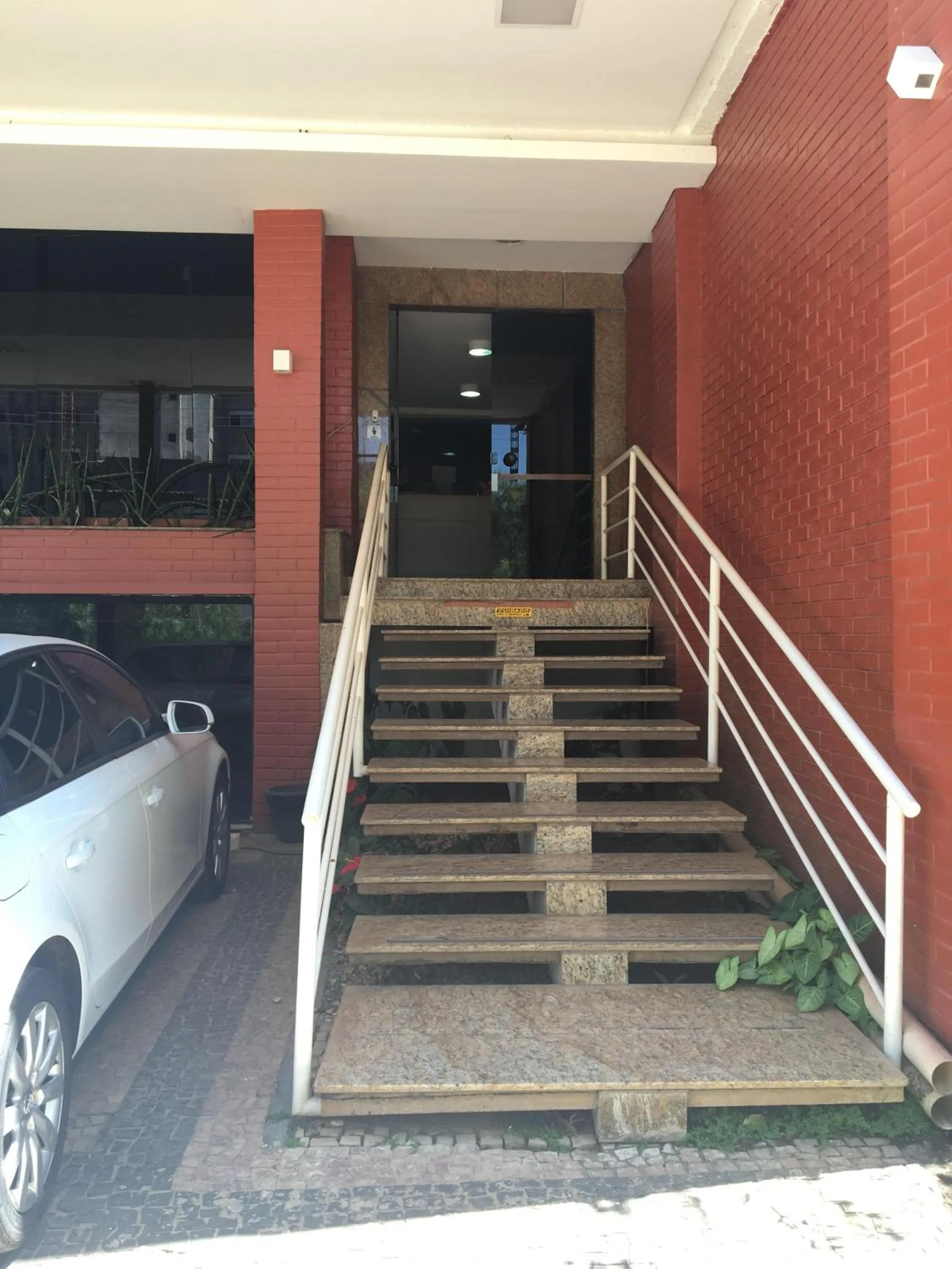 Facade/entrance in Aldeia das Flores Hotel