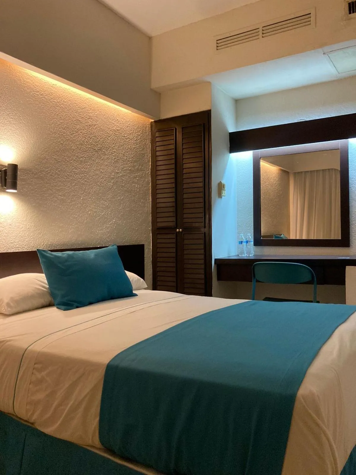 Bed in Howard Johnson by Wyndham Veracruz