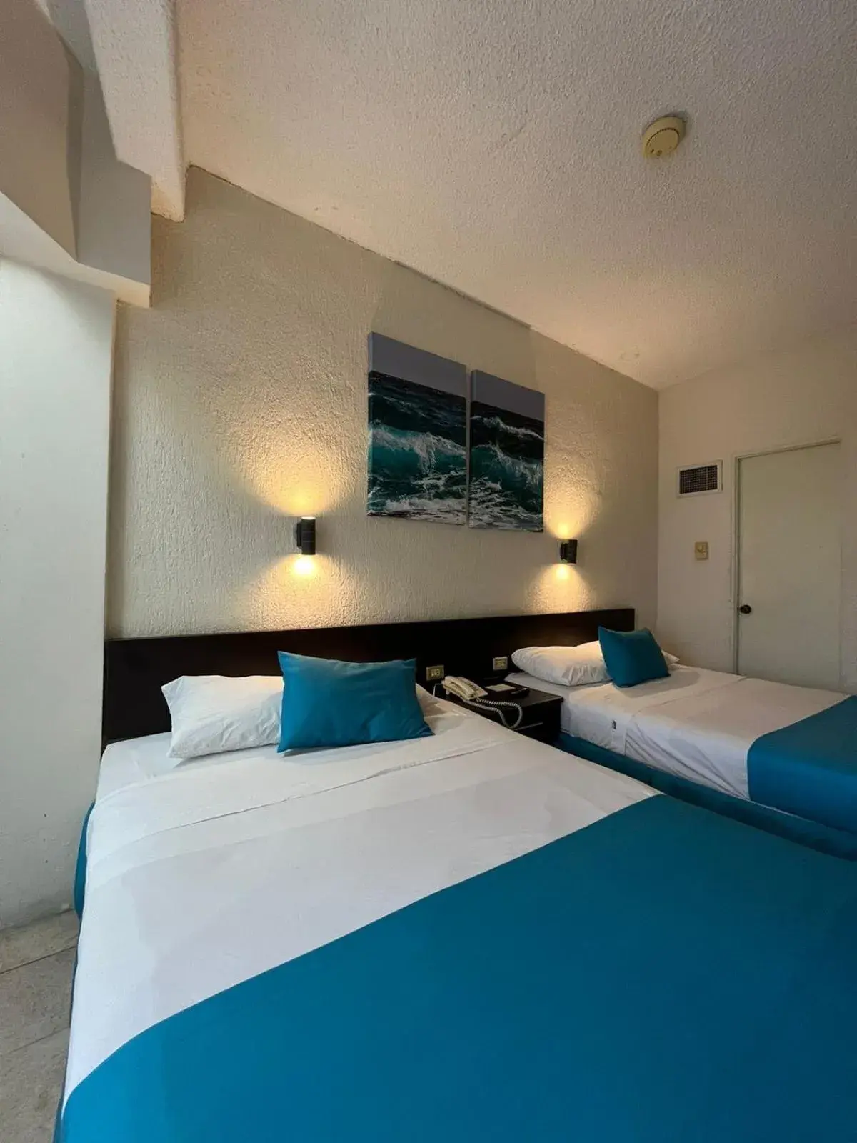 Bed in Howard Johnson by Wyndham Veracruz Bed in Howard Johnson by Wyndham Veracruz