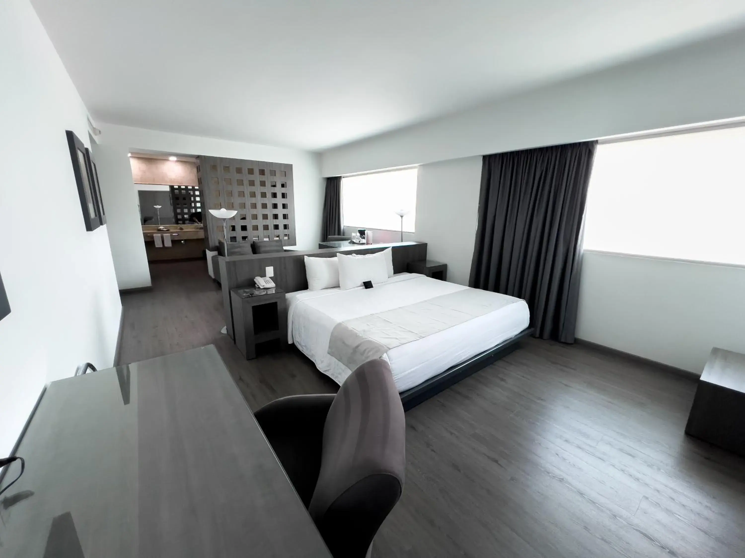 Communal lounge/ TV room, Bed in We Hotel Aeropuerto Communal lounge/ TV room, Bed in We Hotel Aeropuerto