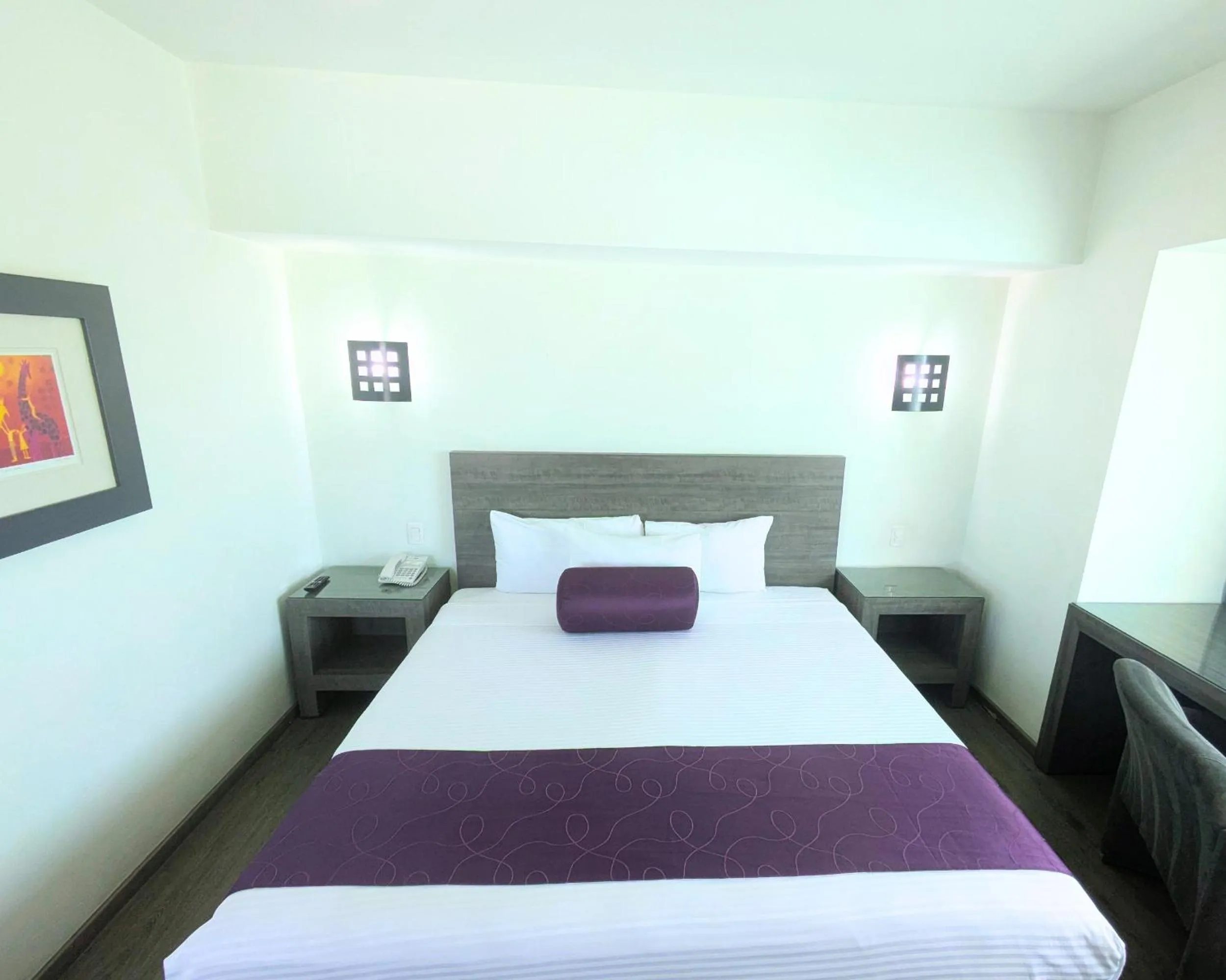 Bed in We Hotel Aeropuerto