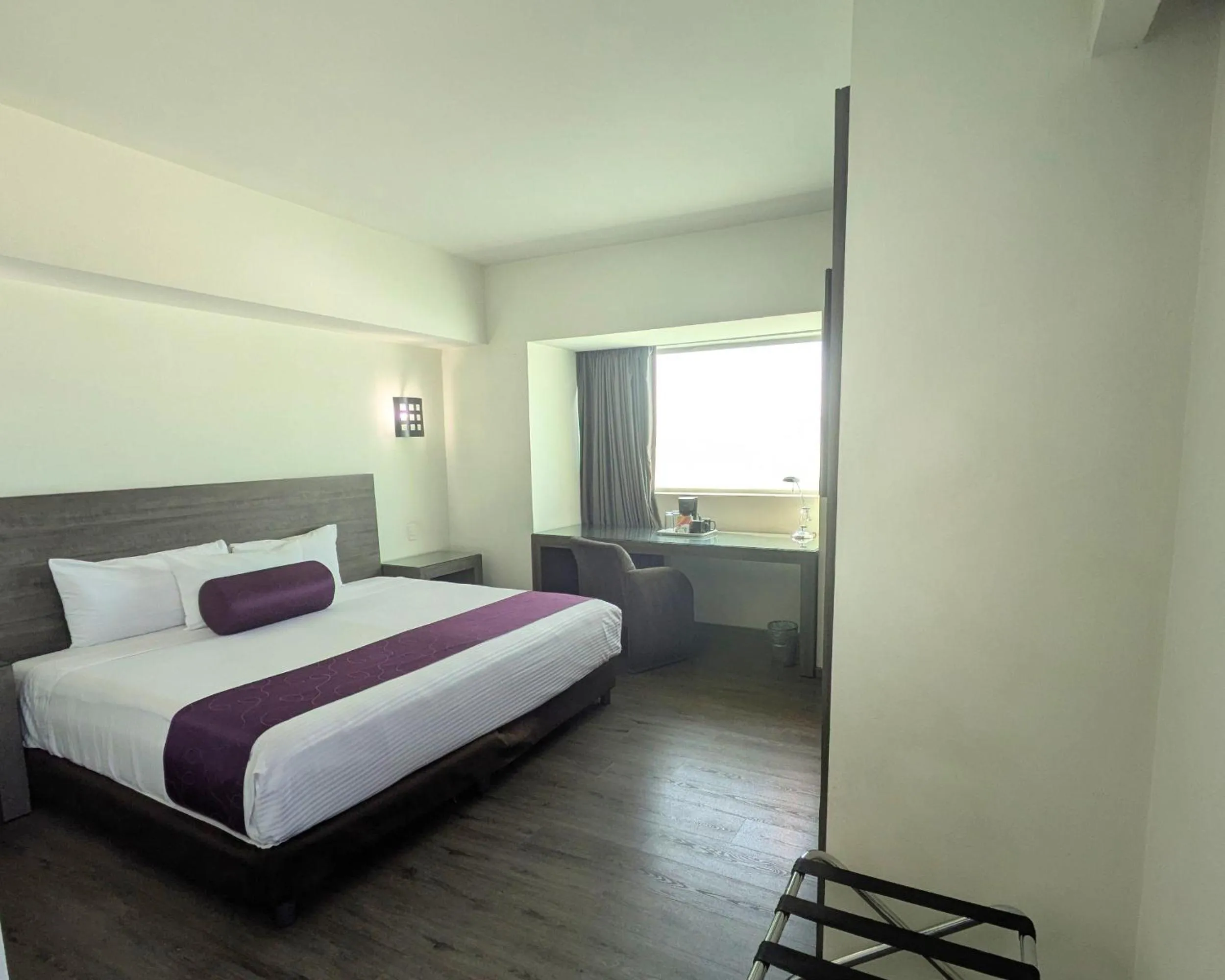 Bed in We Hotel Aeropuerto