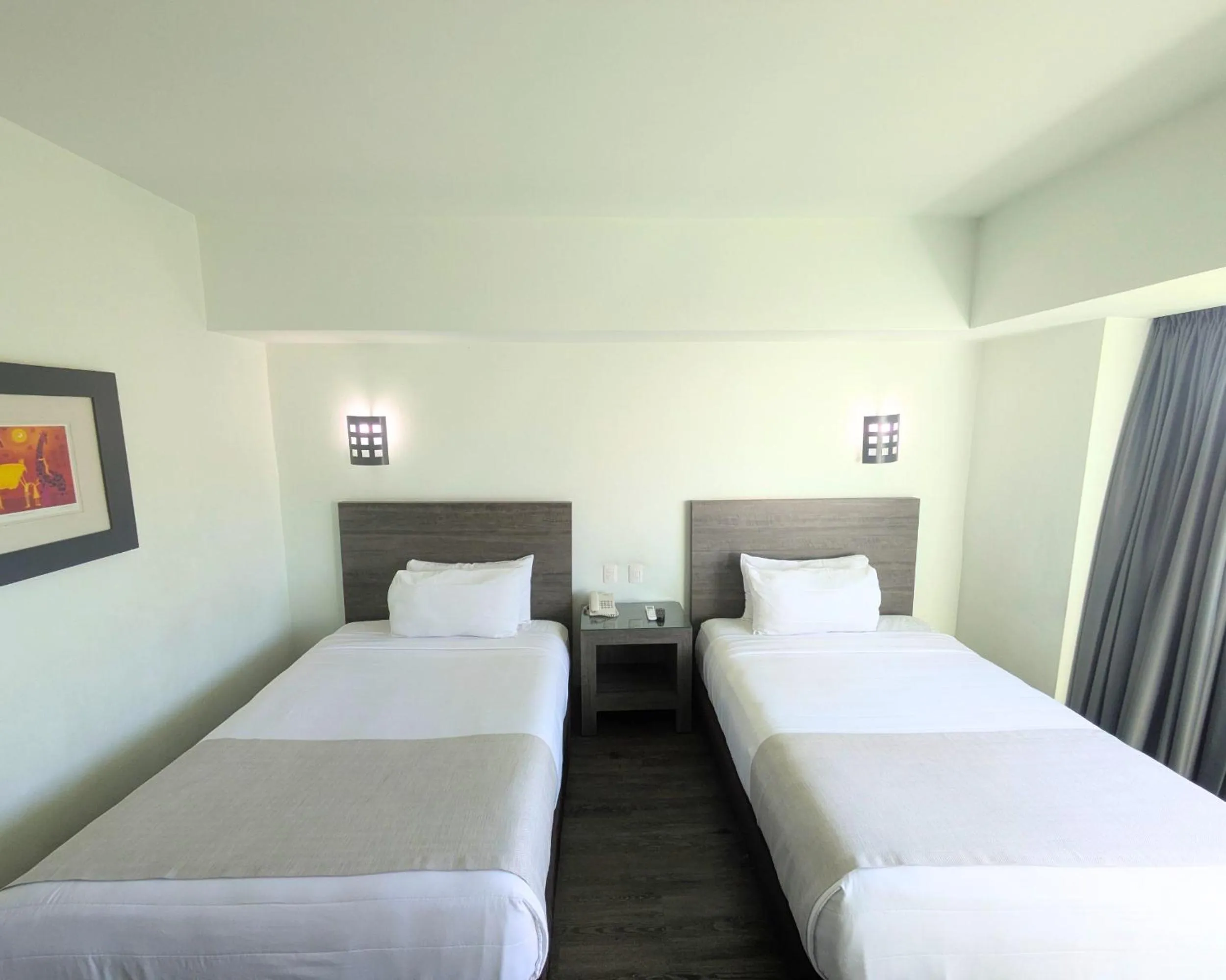 Bed in We Hotel Aeropuerto