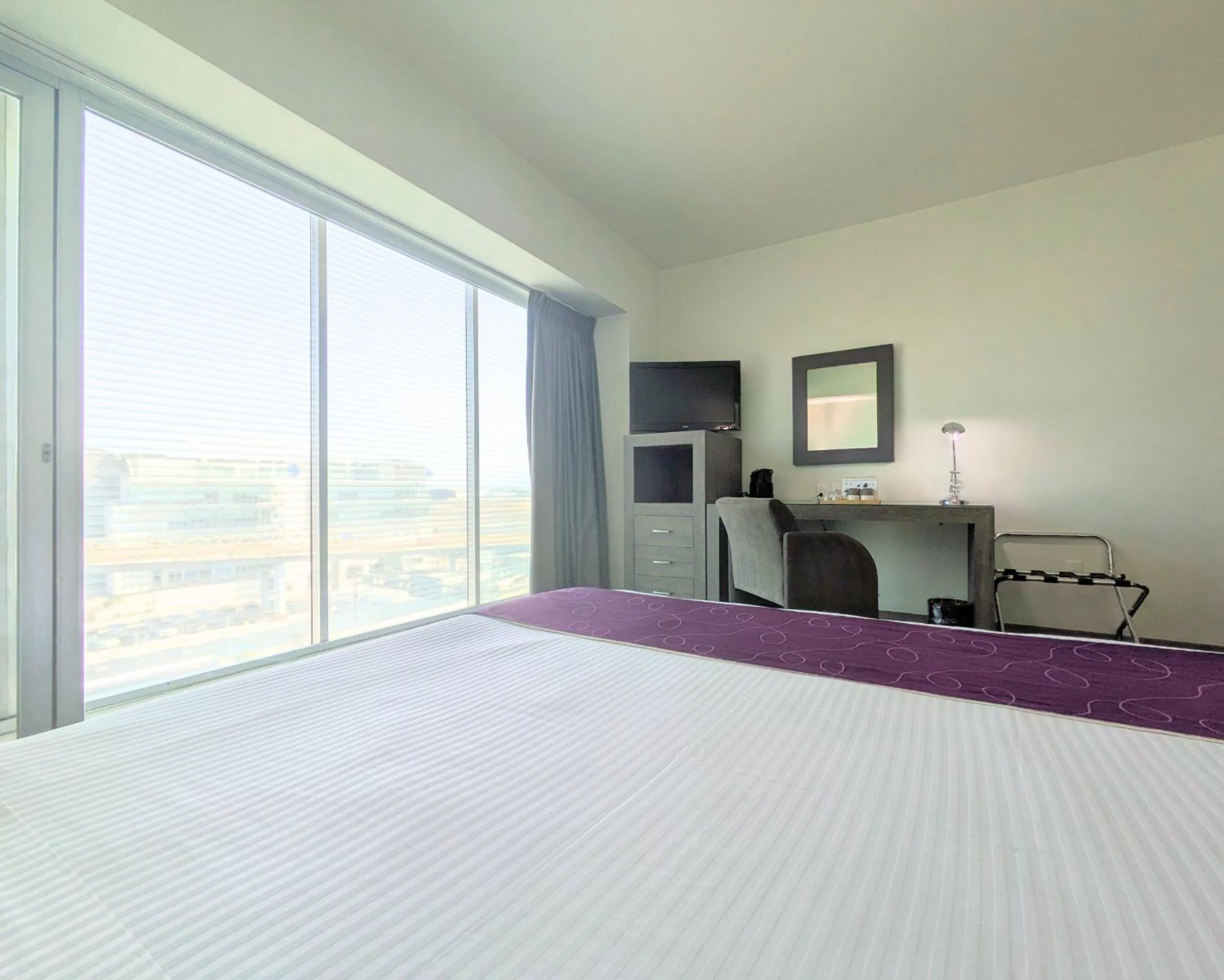 Bed in We Hotel Aeropuerto