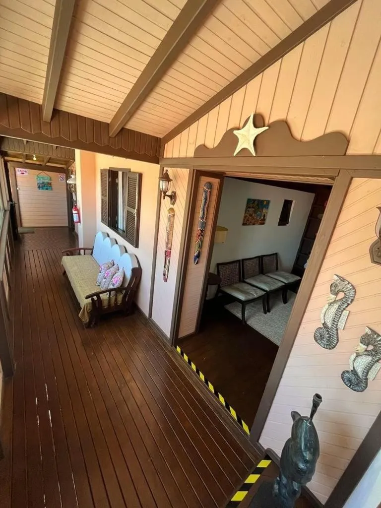 Property building, Bed in Pousada Casa do Oscar