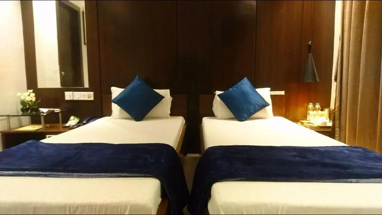 Bedroom, Bed in Tatvam Residency