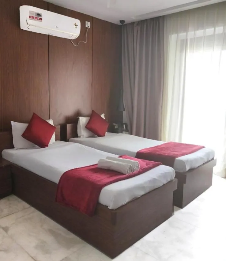 Photo of the whole room, Bed in Tatvam Residency