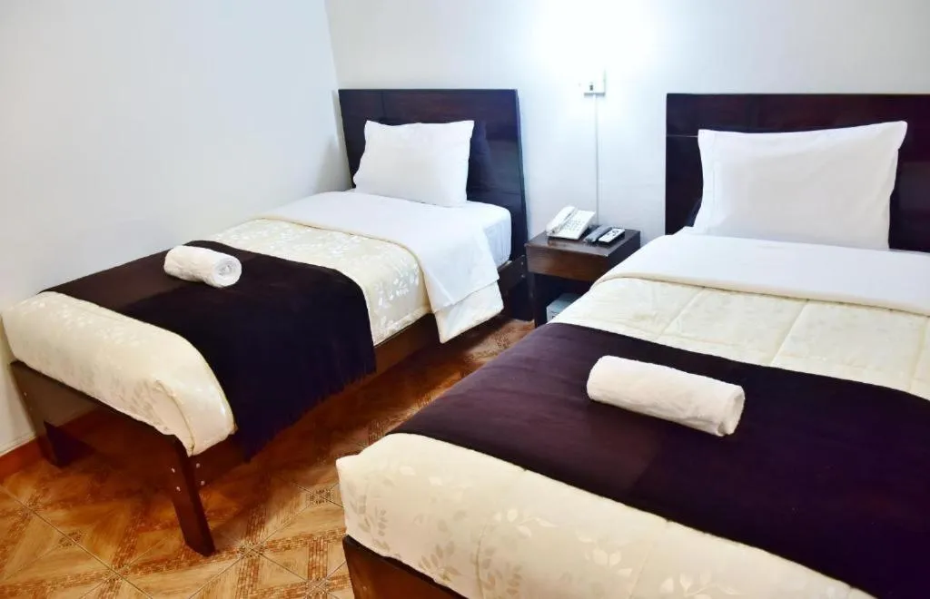 Bed in KASAS DEL INKA MACHUPICCHU