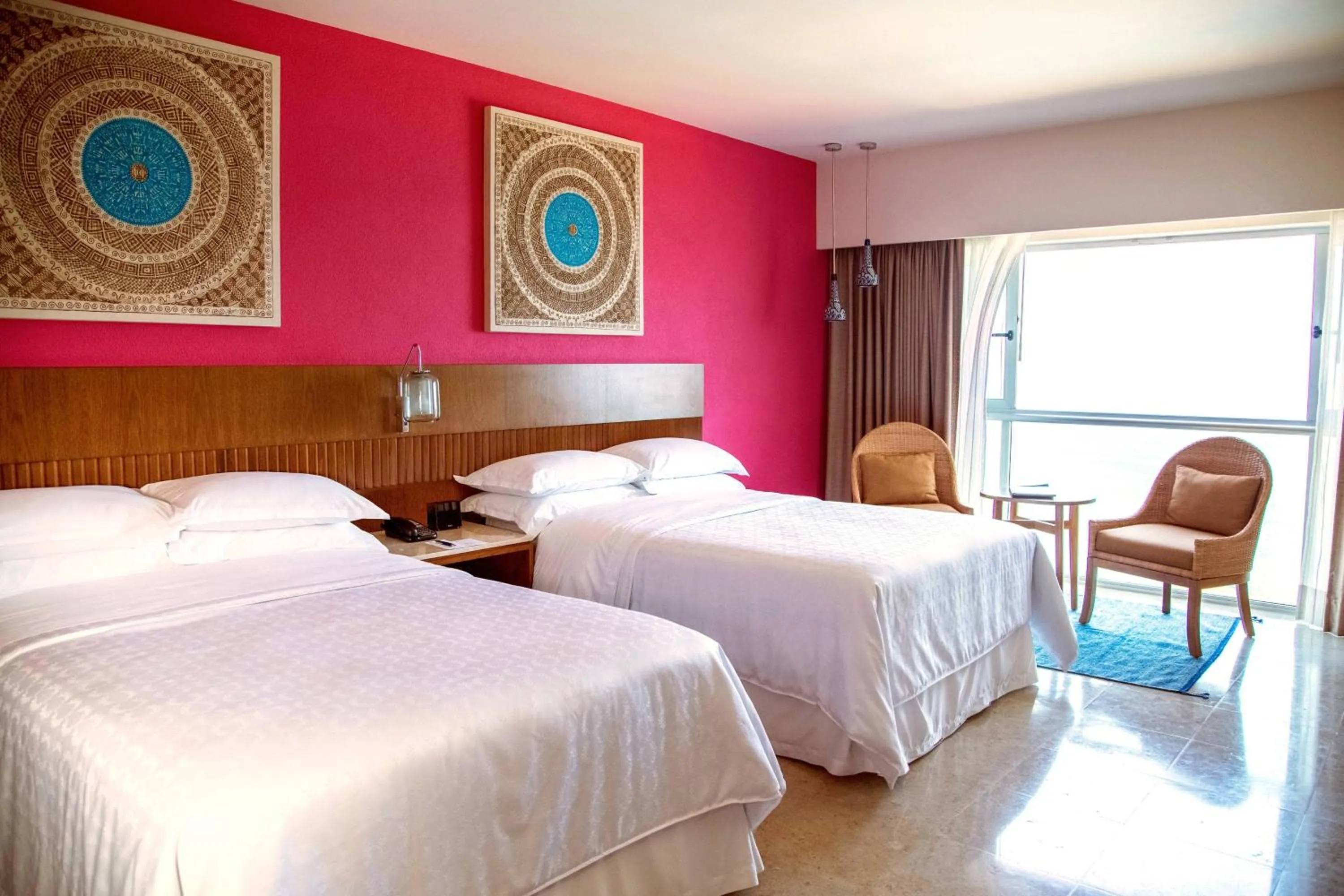 Photo of the whole room, Bed in Sheraton Buganvilias Resort & Convention Center