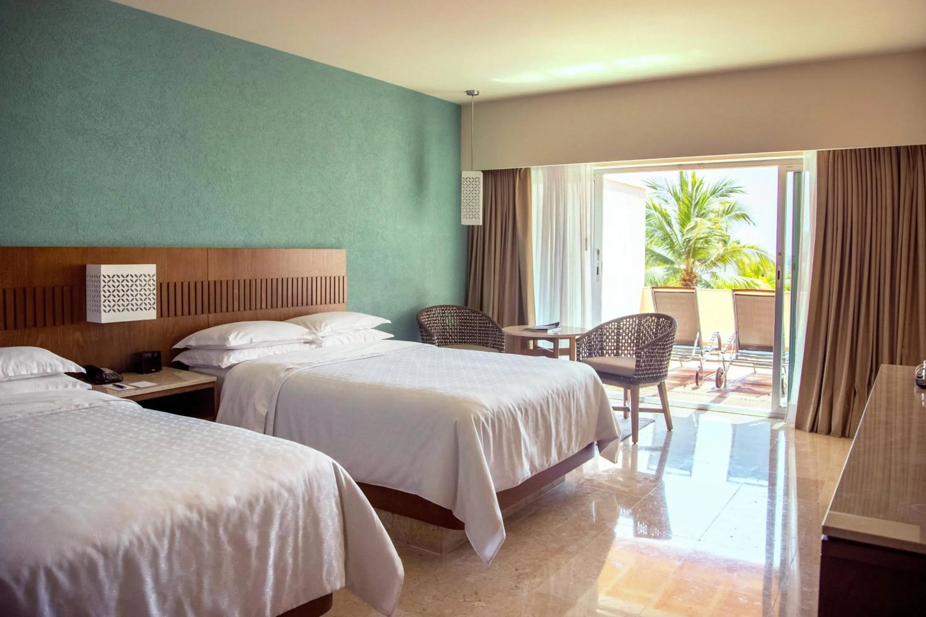 Photo of the whole room, Bed in Sheraton Buganvilias Resort & Convention Center