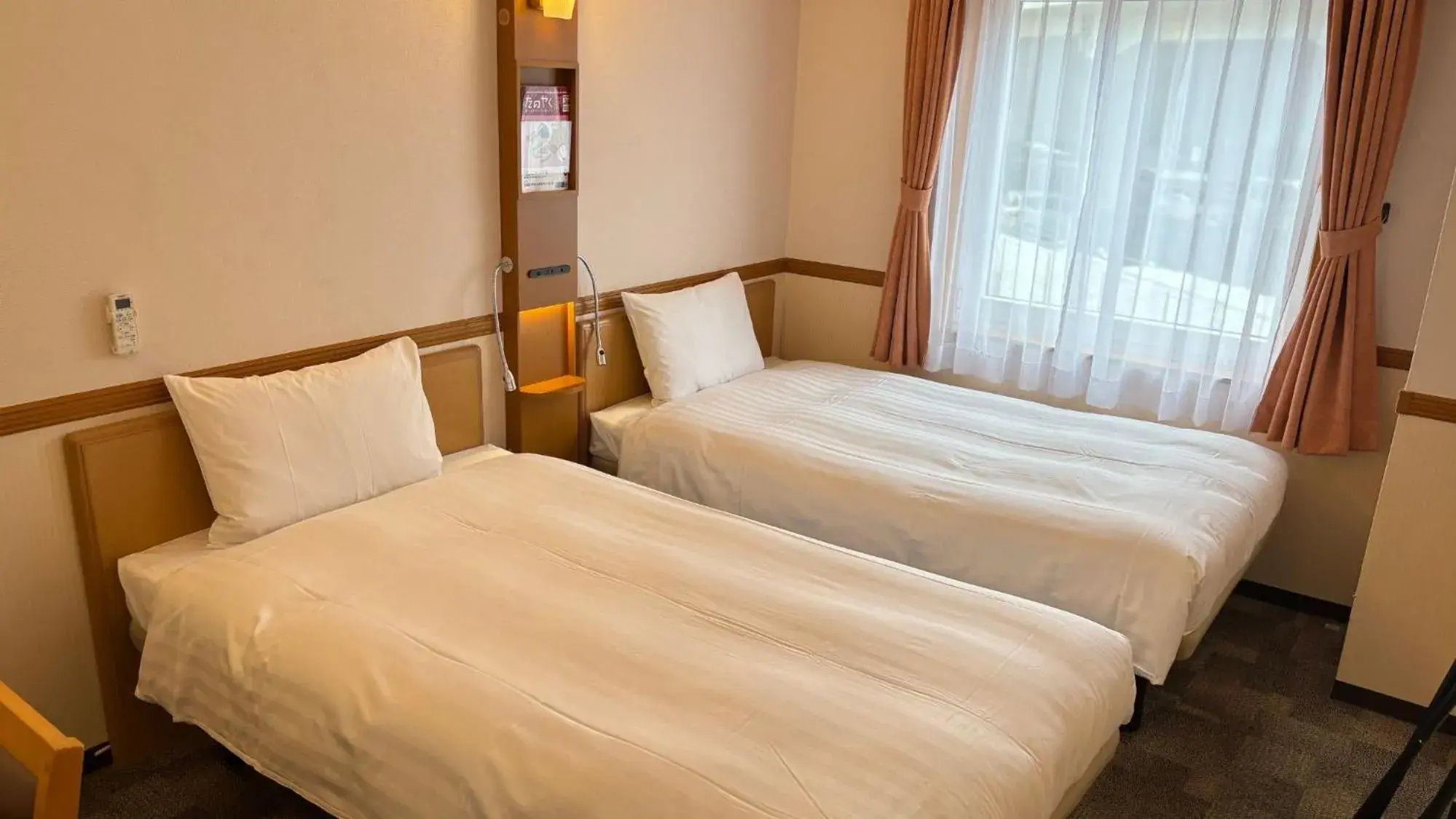 Bed in Toyoko Inn Hokkaido Tokachi Obihiro Ekimae Bed in Toyoko Inn Hokkaido Tokachi Obihiro Ekimae