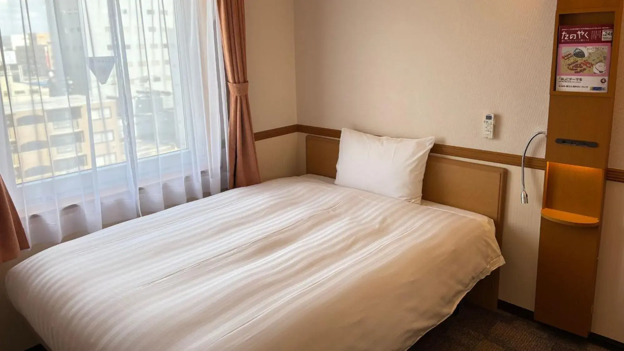 Bed in Toyoko Inn Hokkaido Tokachi Obihiro Ekimae Bed in Toyoko Inn Hokkaido Tokachi Obihiro Ekimae