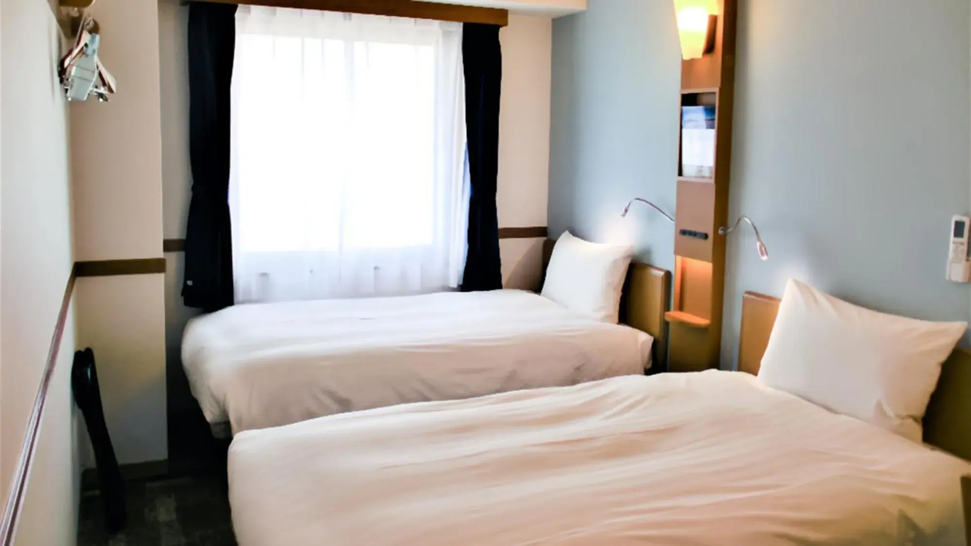 Bedroom, Bed in Toyoko Inn Tokyo Korakuen Bunkyokuyakusho Mae Bedroom, Bed in Toyoko Inn Tokyo Korakuen Bunkyokuyakusho Mae