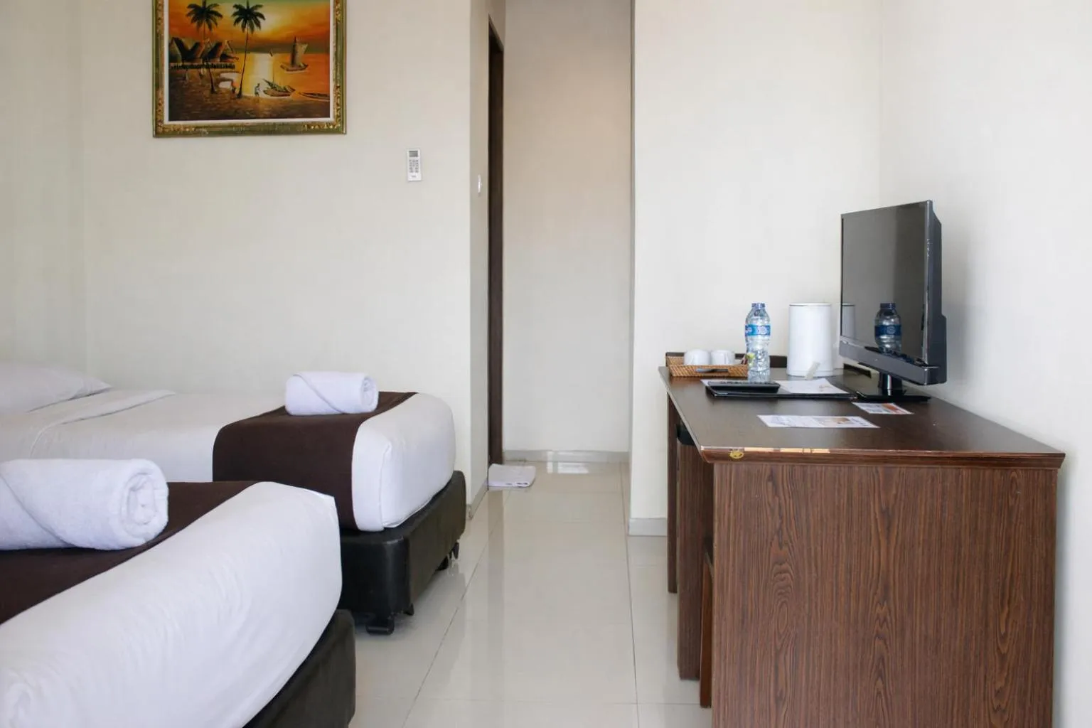 Bed in Manggar Indonesia Hotel