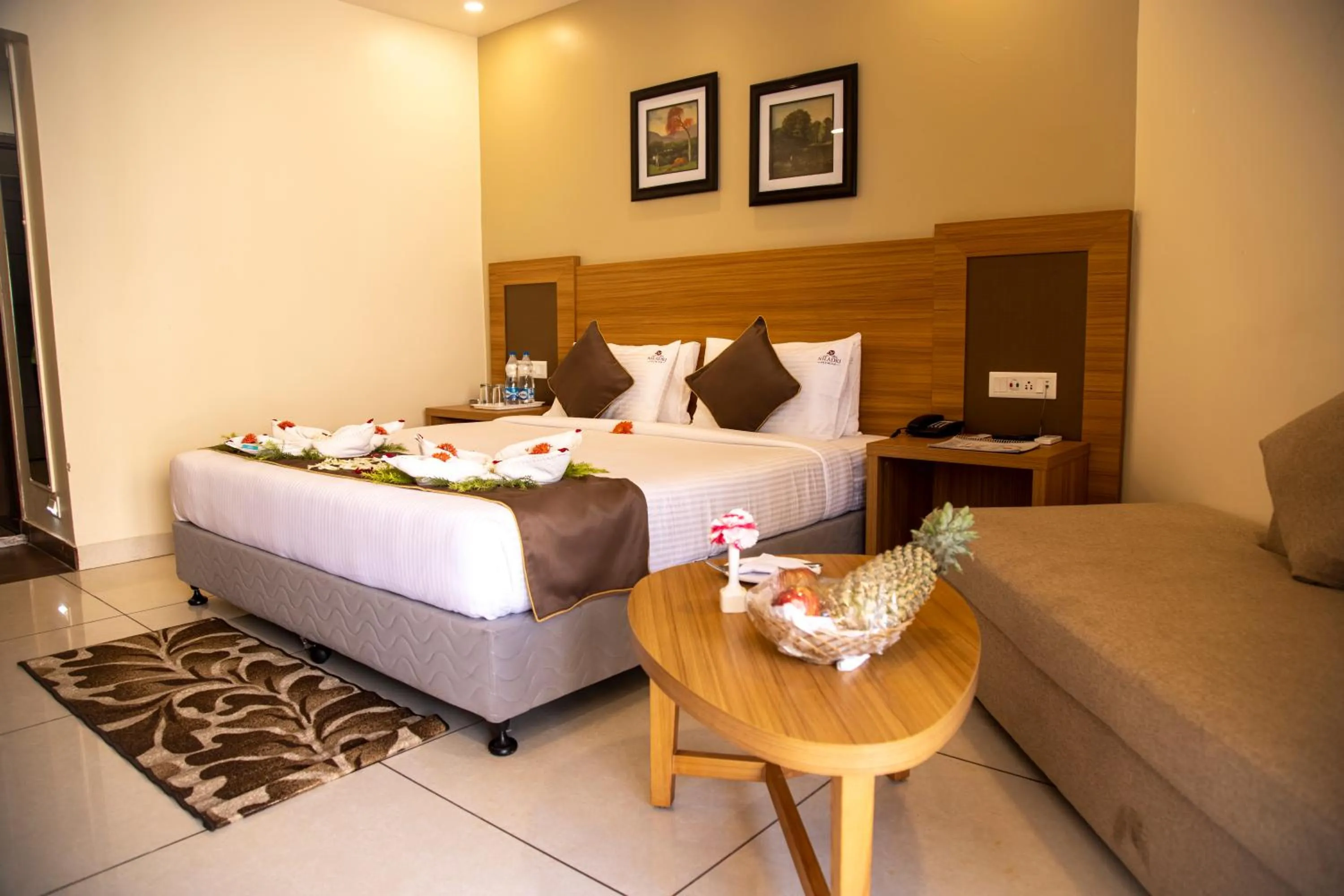 Photo of the whole room, Bed in HOTEL NILADRI PREMIUM