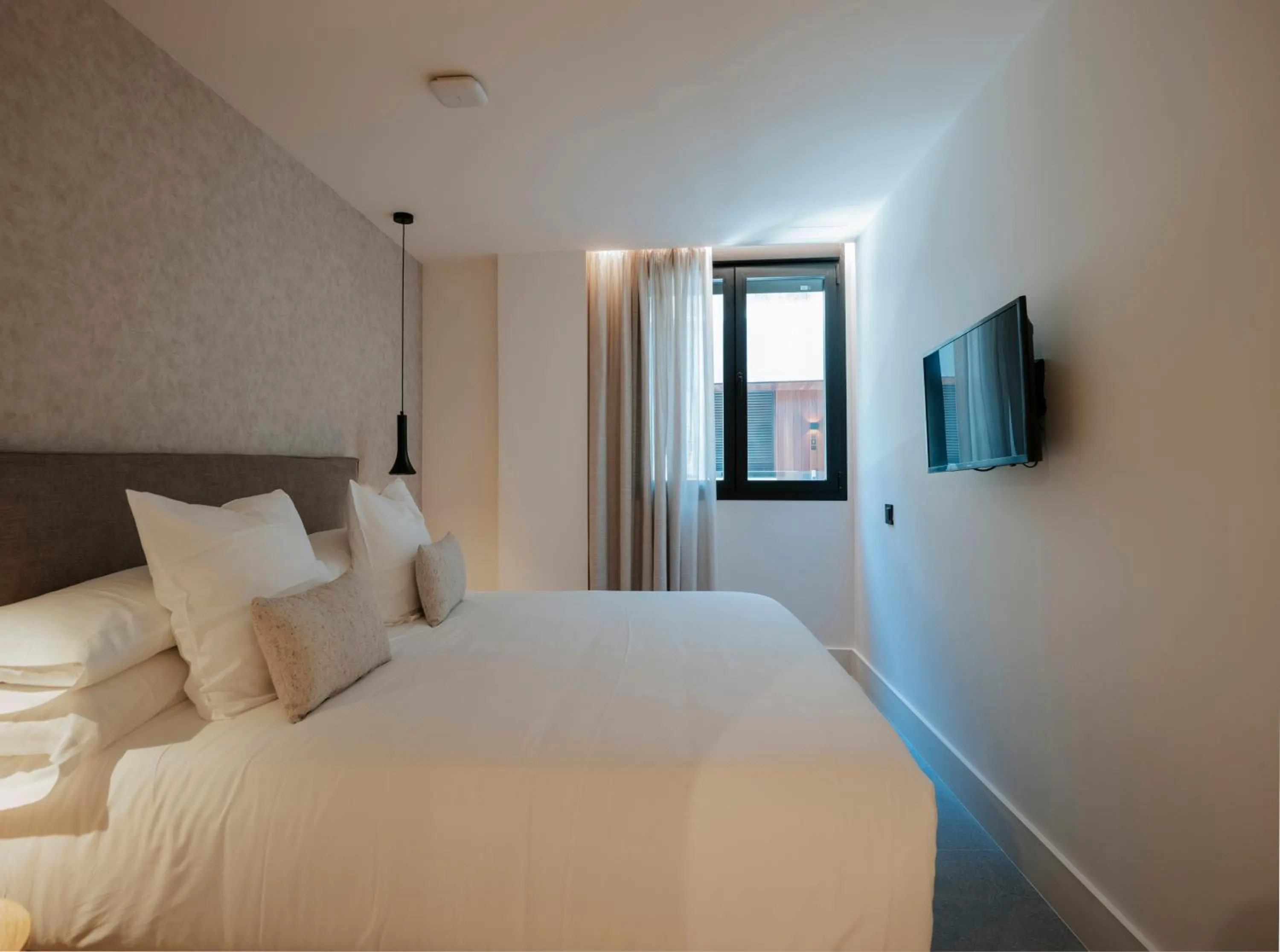 Bed in TocToc Suites Olof Palme - Viviendas Vacacionales
