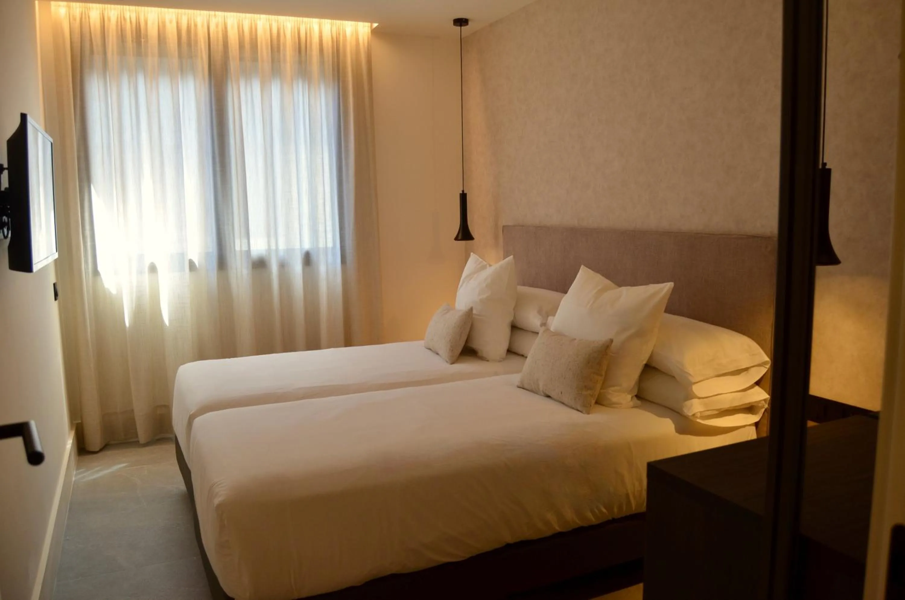 Bed in TocToc Suites Olof Palme - Viviendas Vacacionales
